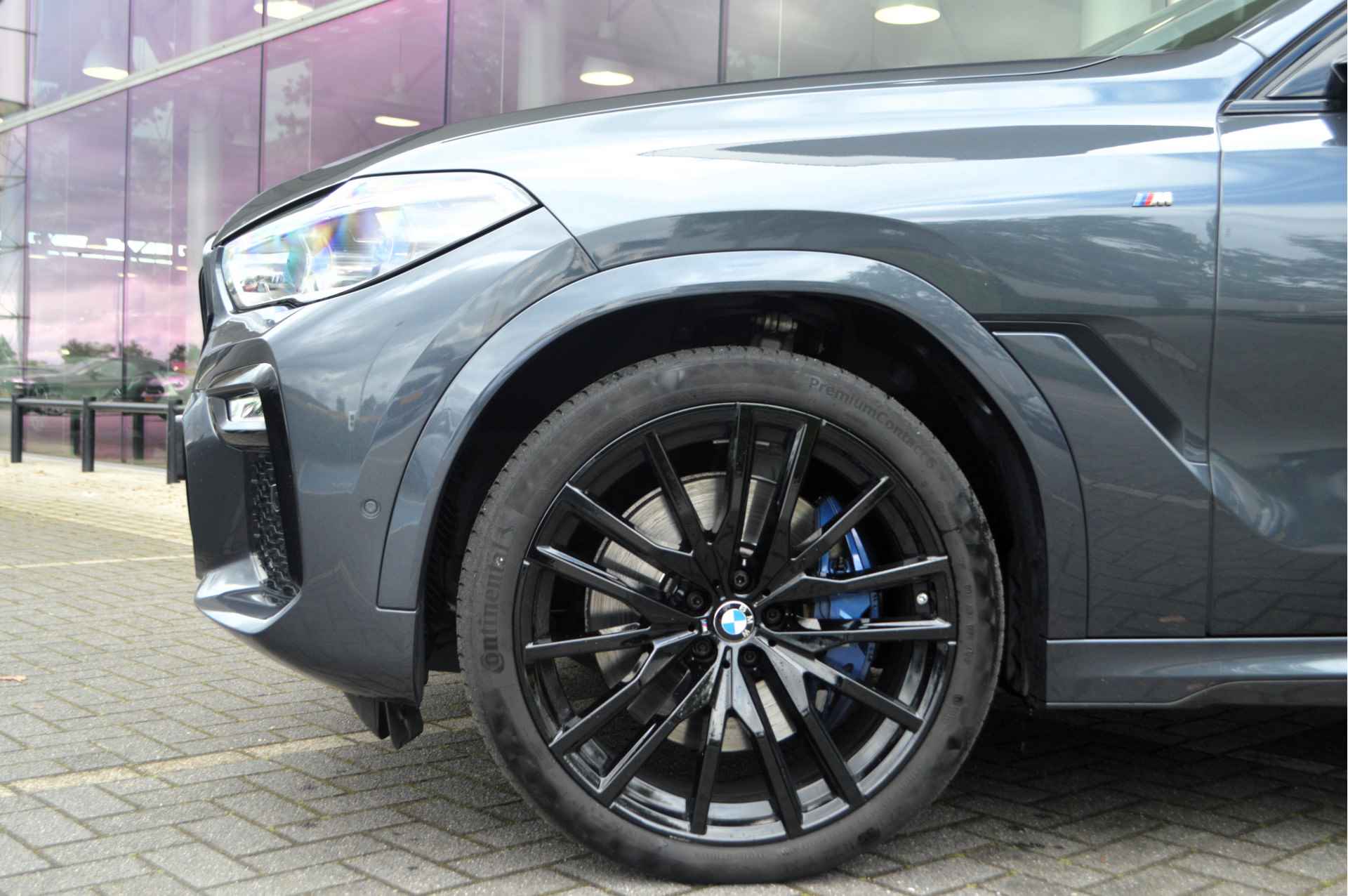 BMW X6 M50i High Executive Automaat / Panoramadak Sky Lounge / Laserlight / Bowers & Wilkins / Parking Assistant Plus / Adaptief M Onderstel / Stoelventilatie - 11/37