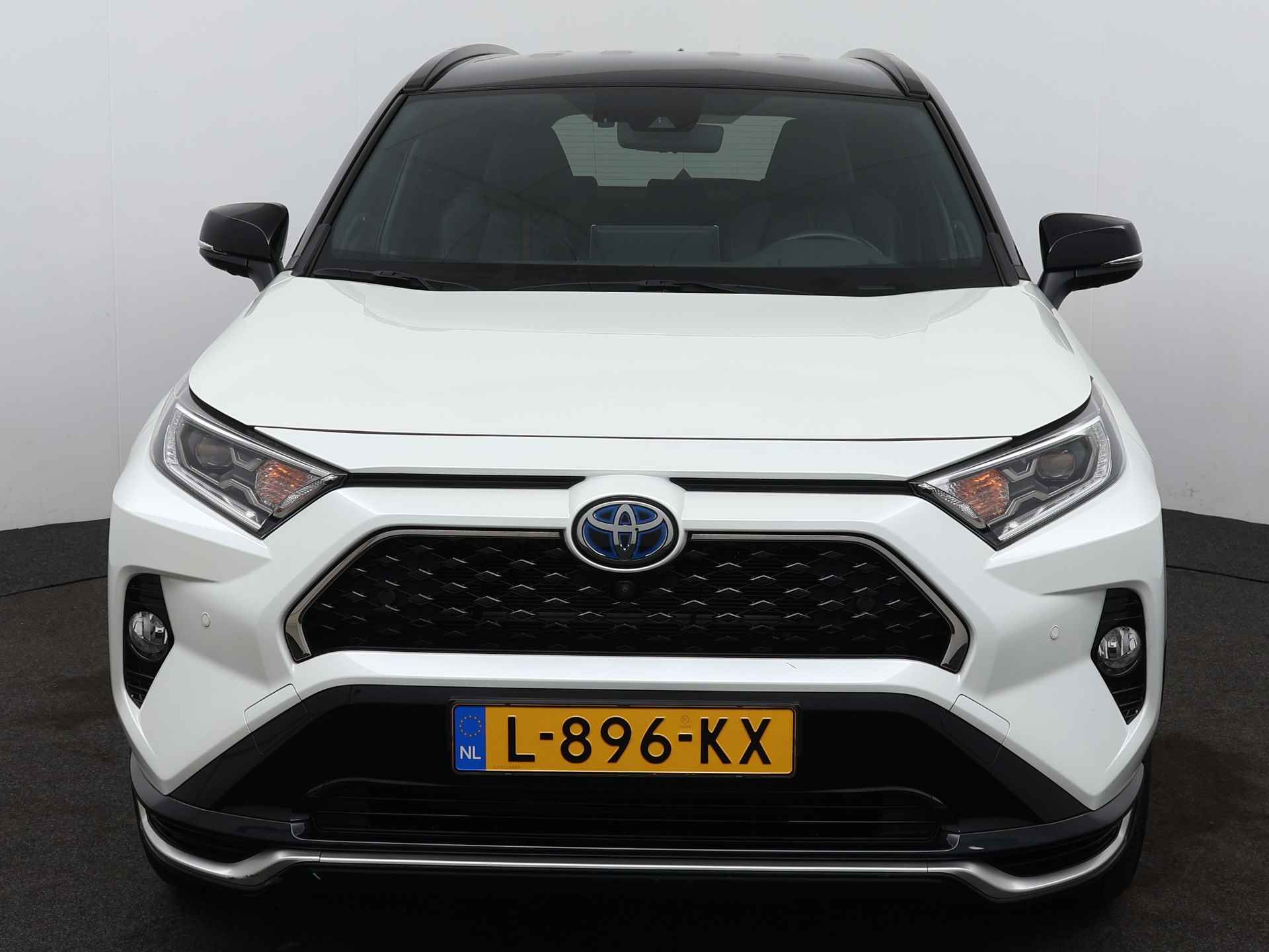 Toyota RAV4 2.5 Plug-in Hybrid AWD Bi-Tone Plus | Dodehoekdetector | Verwarmde voorstoelen | *pd ovv finan lease 21/2 - 25/41