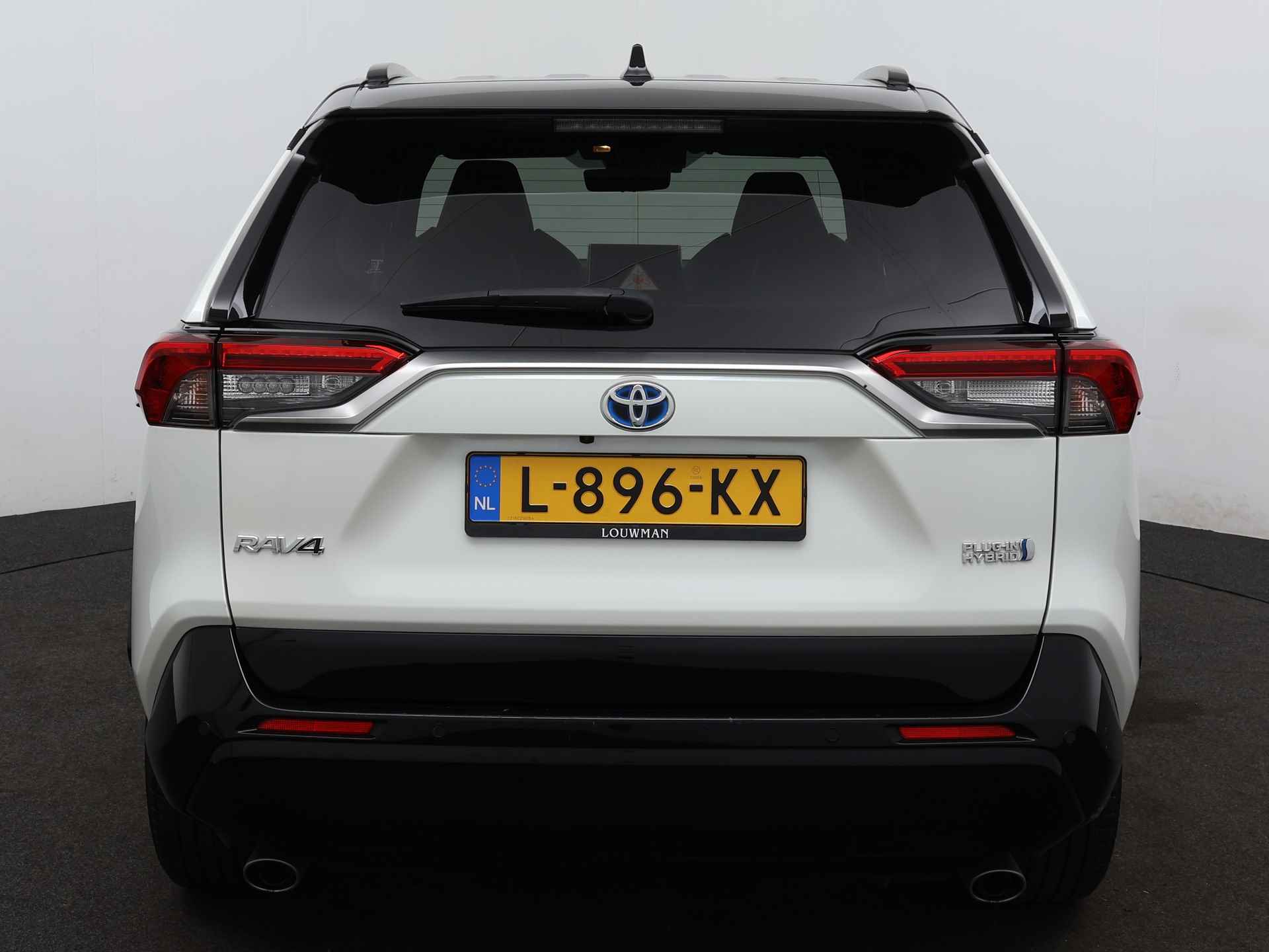 Toyota RAV4 2.5 Plug-in Hybrid AWD Bi-Tone Plus | Dodehoekdetector | Verwarmde voorstoelen | *pd ovv finan lease 21/2 - 27/41