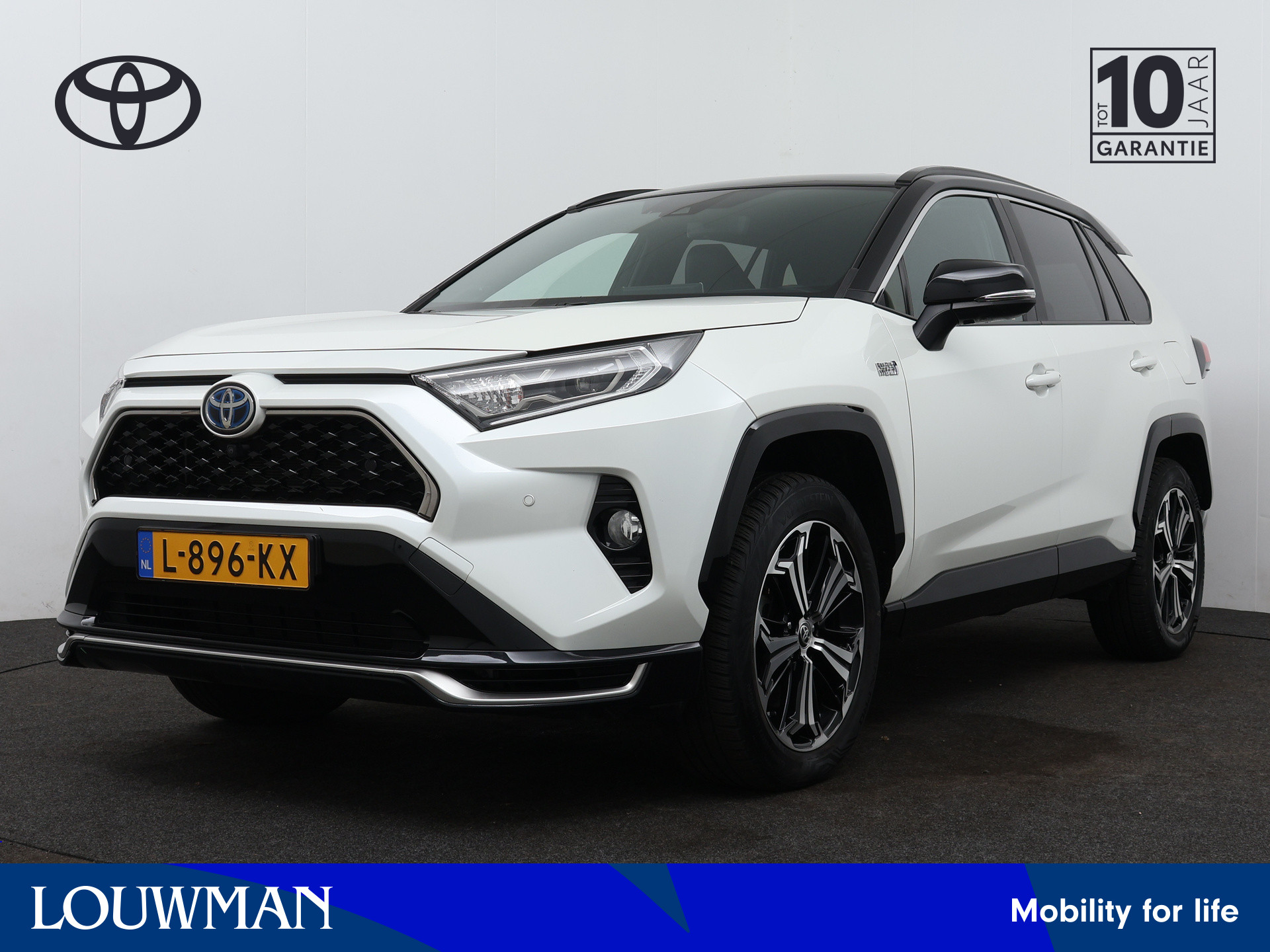 Toyota RAV4 2.5 Plug-in Hybrid AWD Bi-Tone Plus | Dodehoekdetector | Verwarmde voorstoelen | *pd ovv finan lease 21/2