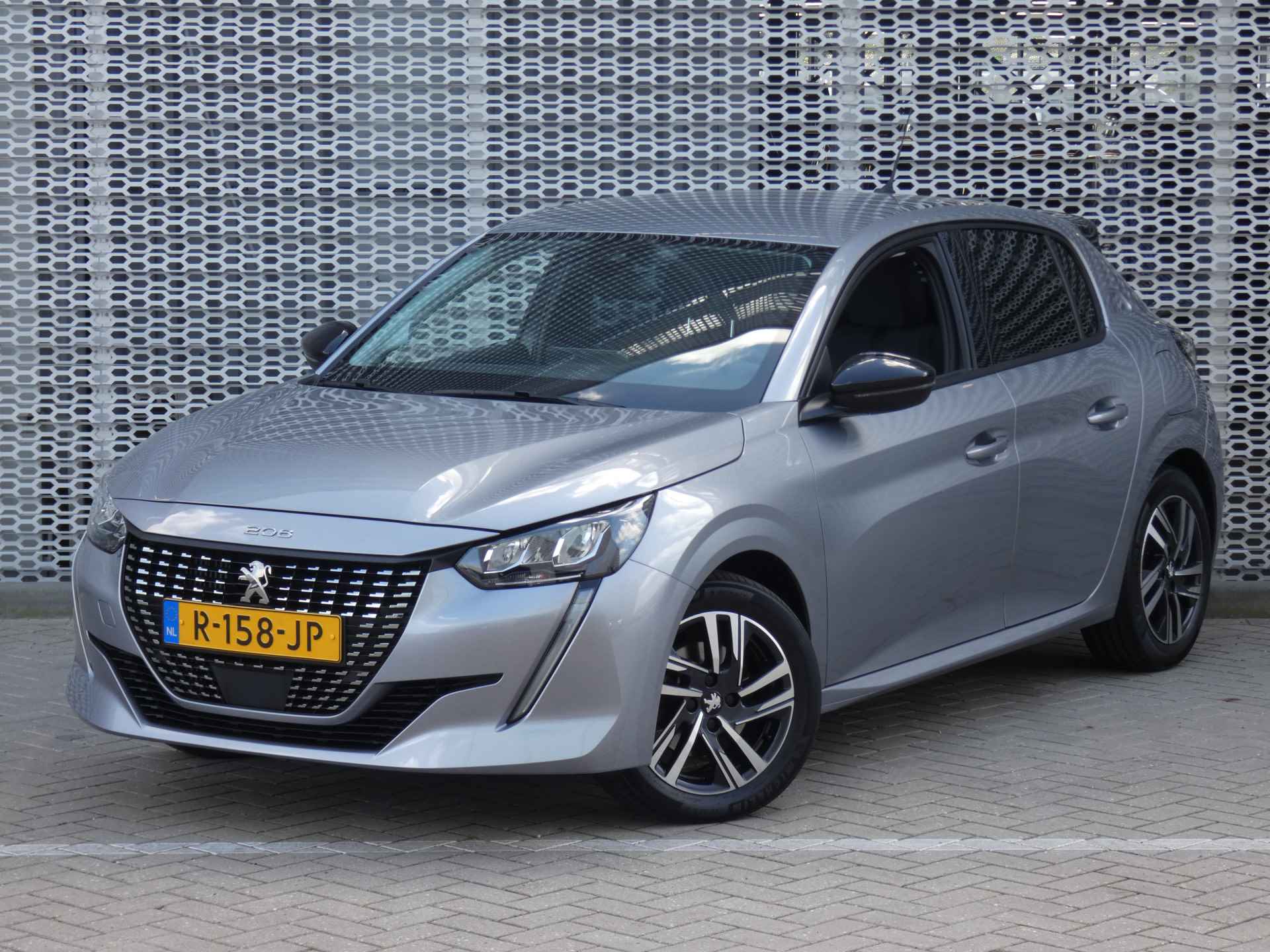 Peugeot 208 1.2 100PK Allure Pack Automaat | Stoelverwarming | Adaptive cruise control | Camera - 32/45