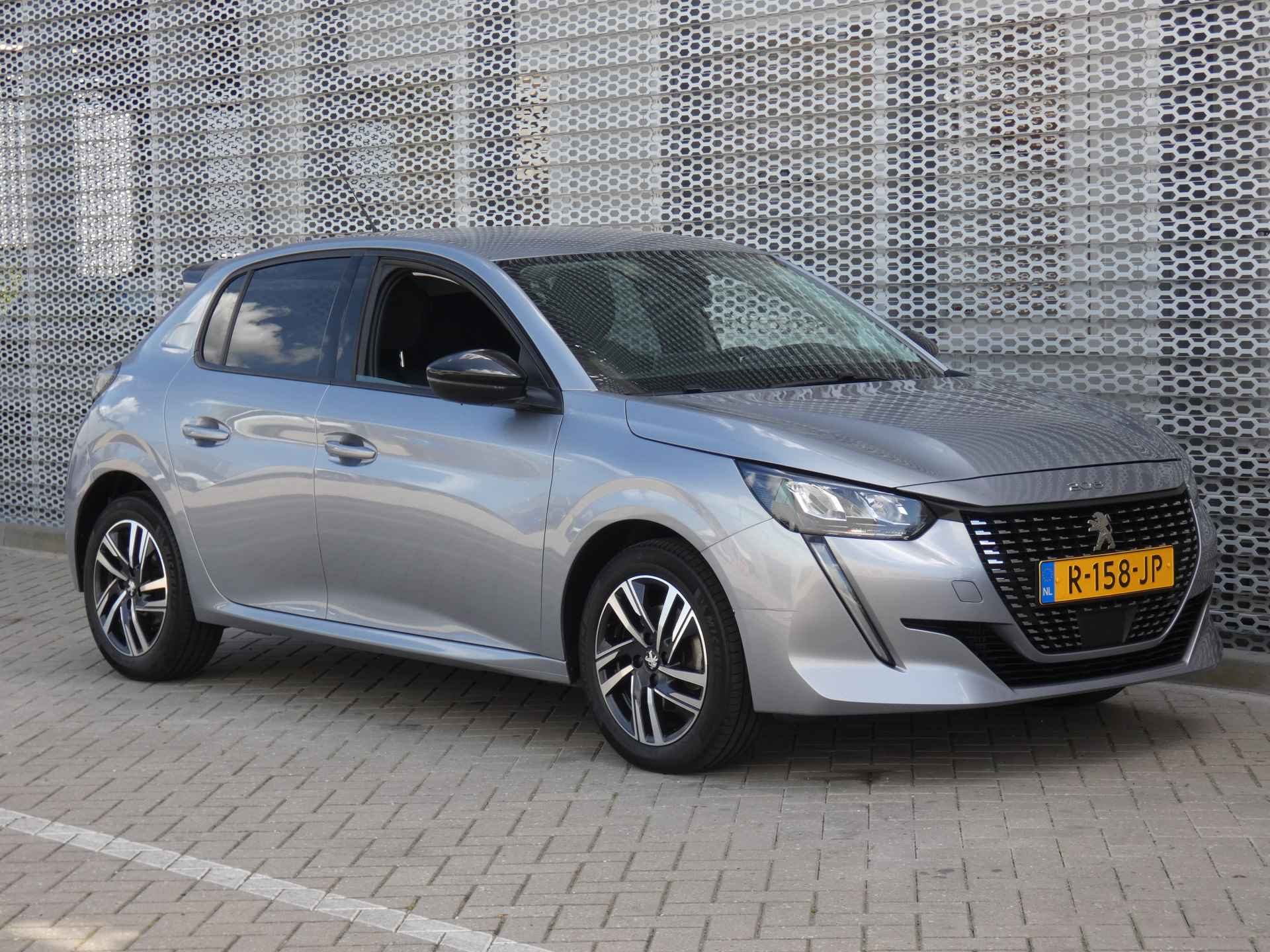 Peugeot 208 1.2 100PK Allure Pack Automaat | Stoelverwarming | Adaptive cruise control | Camera - 35/45