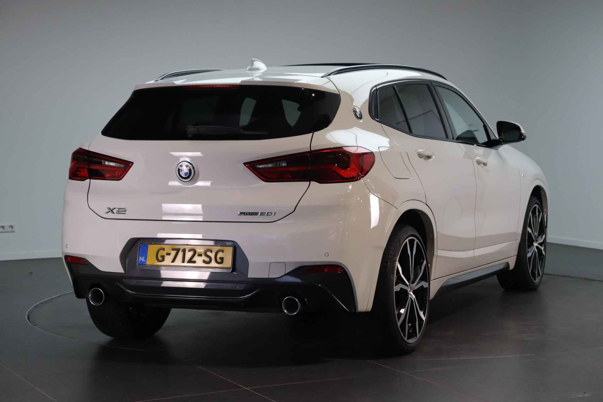 BMW X2 sDrive20i High Executive M Sport Automaat / Panoramadak / M Sportstoelen / LED / Stoelverwarming / Cruise Control / Head-Up / Park Assistant - 4/22