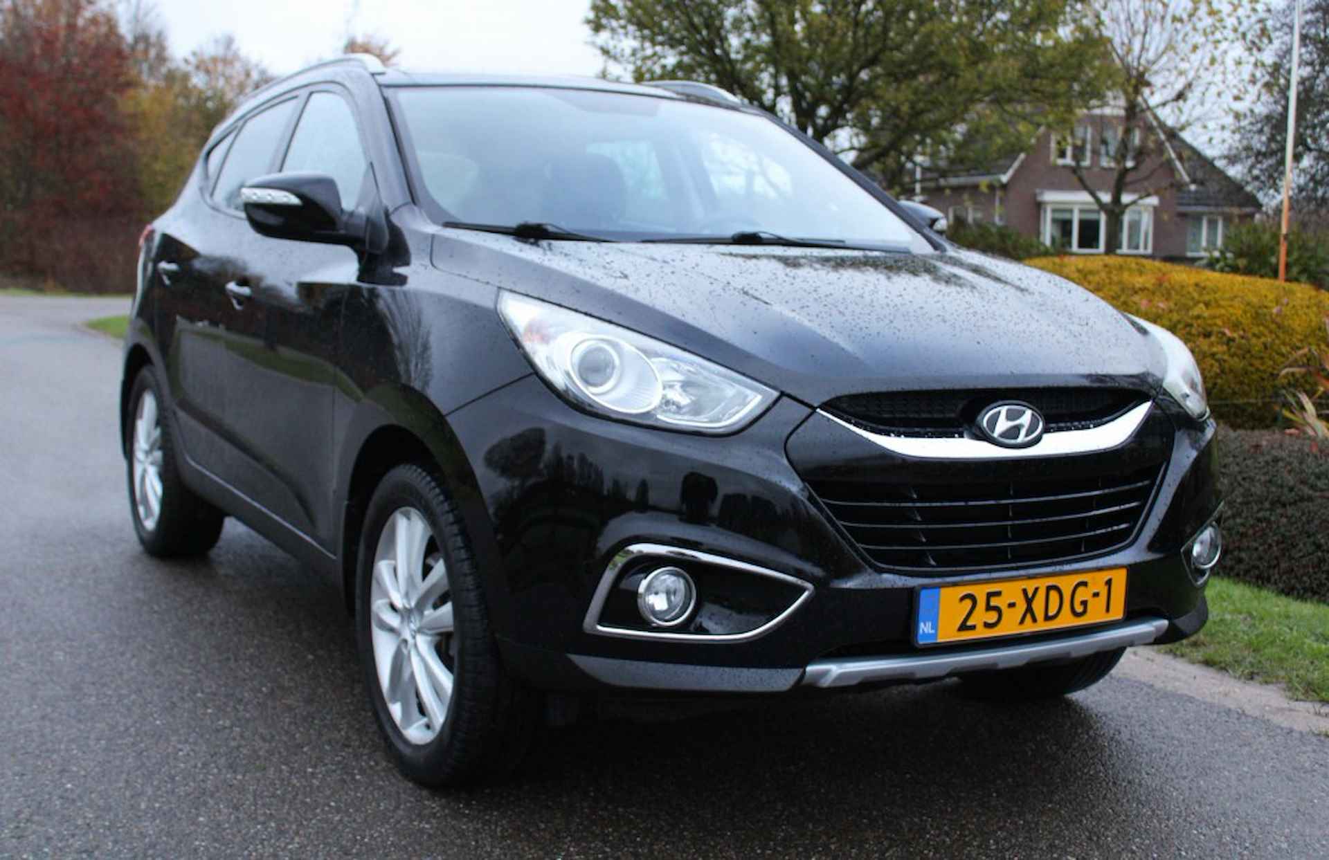 HYUNDAI Ix35 2.0i 163pk 4WD i-Catcher ECC/cruise/leer/navi/trekhaak/schuifdak - 31/33