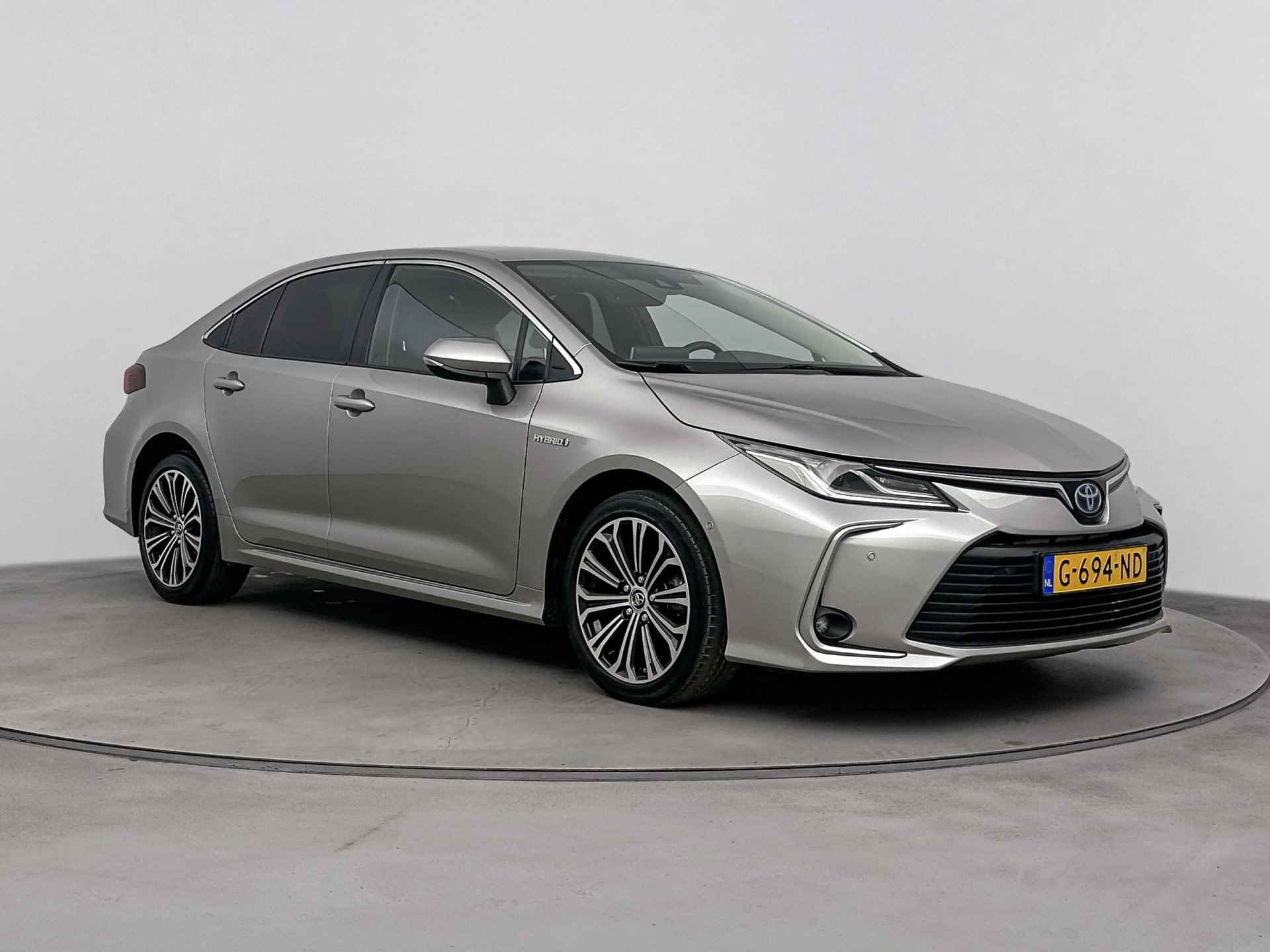 Toyota Corolla 1.8 Hybrid Style | Navigatie | Climate Control | Stoelverwarming | Draadloze telefoonlader | Parkeersensoren | Parkeerhulp | - 27/39