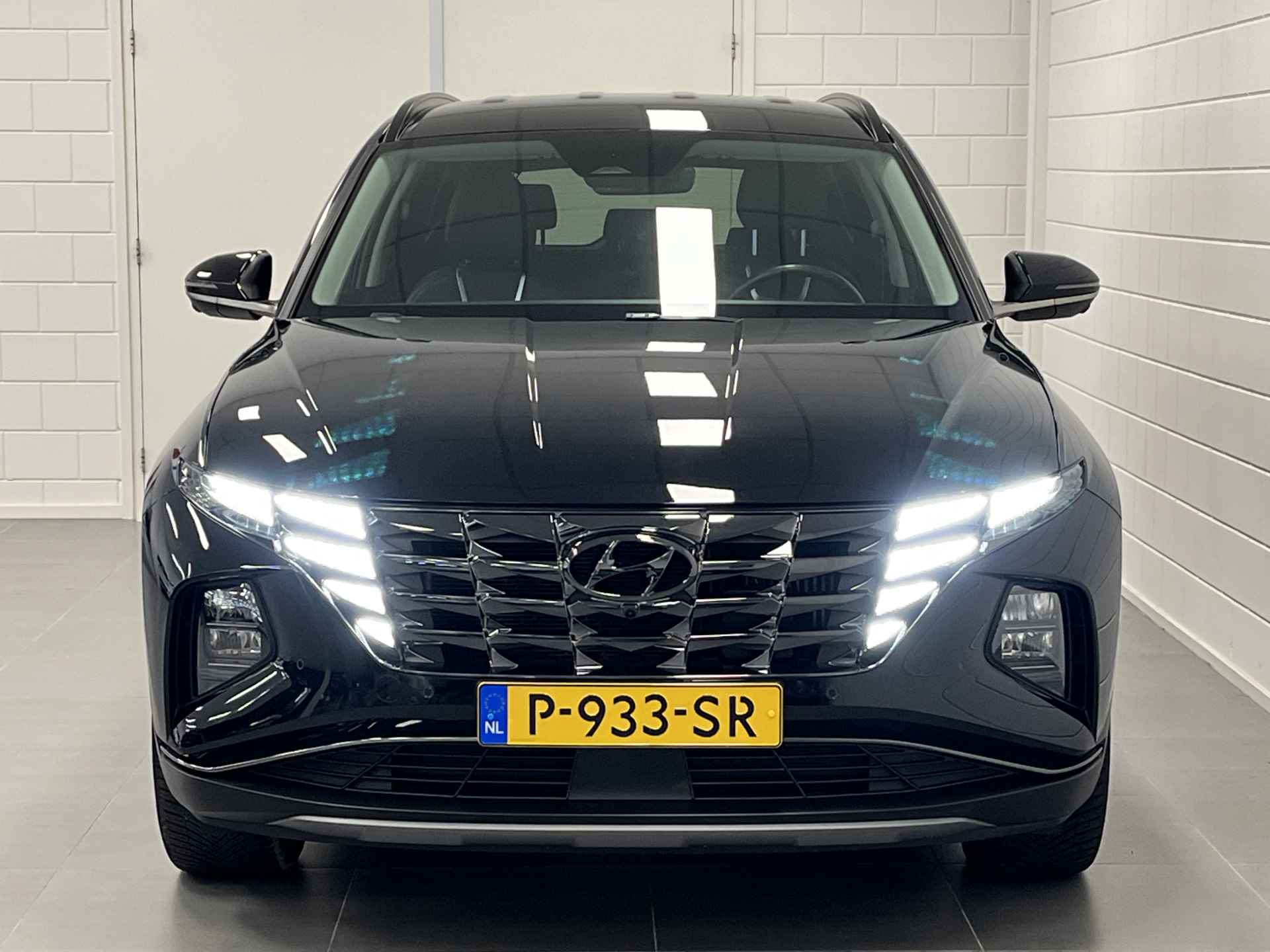 Hyundai Tucson 1.6 T-GDI PHEV Premium 4WD TREKHAAK | LEDER | NAVIGATIE | FULL LED | KEYLESS - 49/52