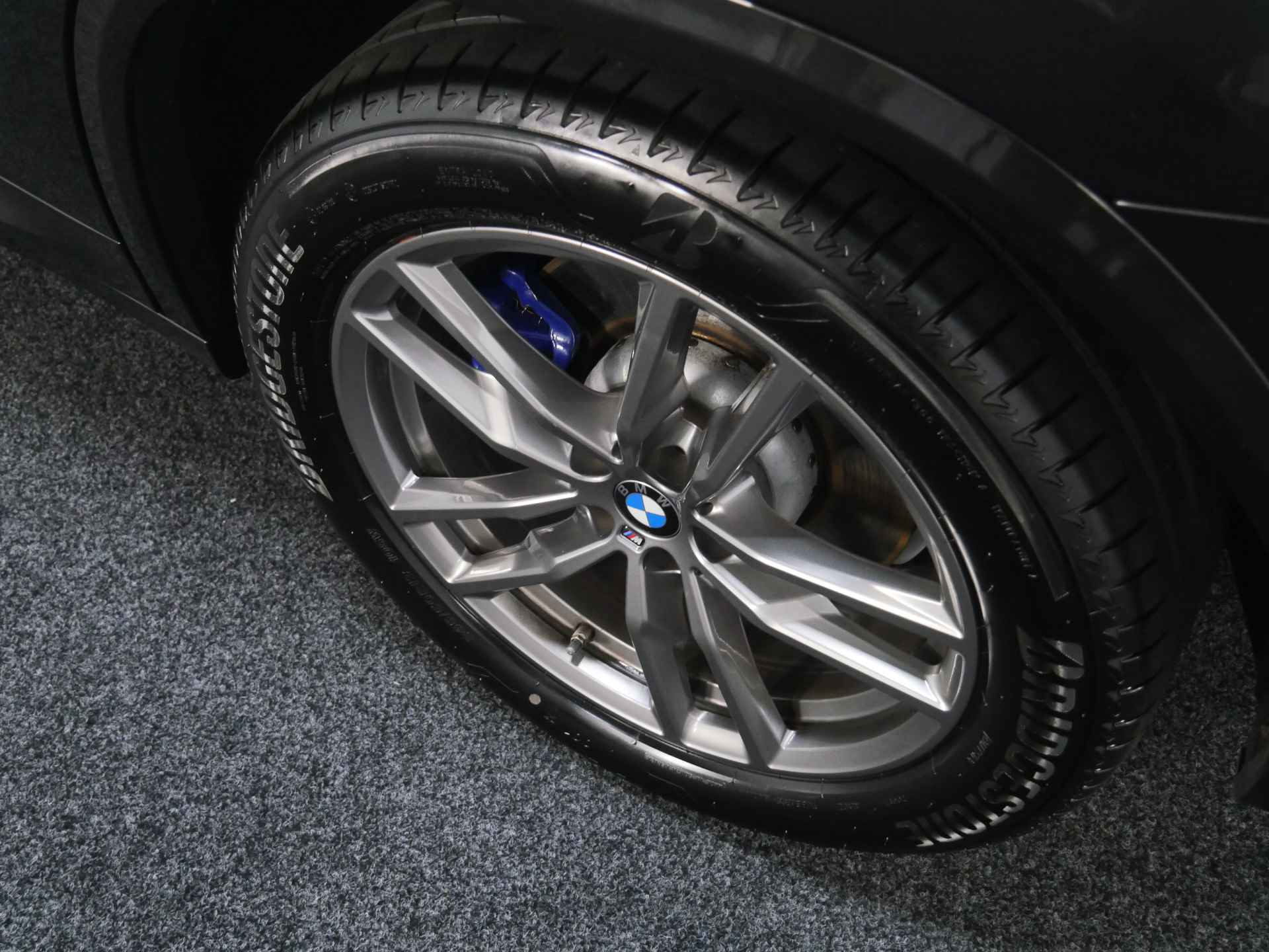 BMW X3 xDrive30e High Executive M Sport Automaat / Panoramadak / Sportstoelen / Adaptieve LED / Head-Up / Harman Kardon / Live Cockpit Professional / Parking Assistant - 28/34