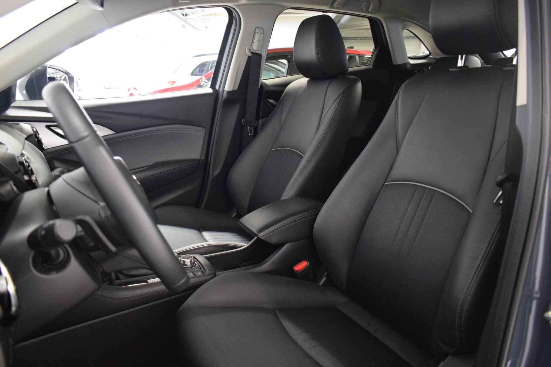 Mazda CX-3 2.0 SkyActiv-G 121 Luxury | Achteruitrijcamera | Parkeersensoren | Dodehoek detectie | Cruise control | Stoelverwarming | Head-up | Navigatie | Keyless entry | - 19/50