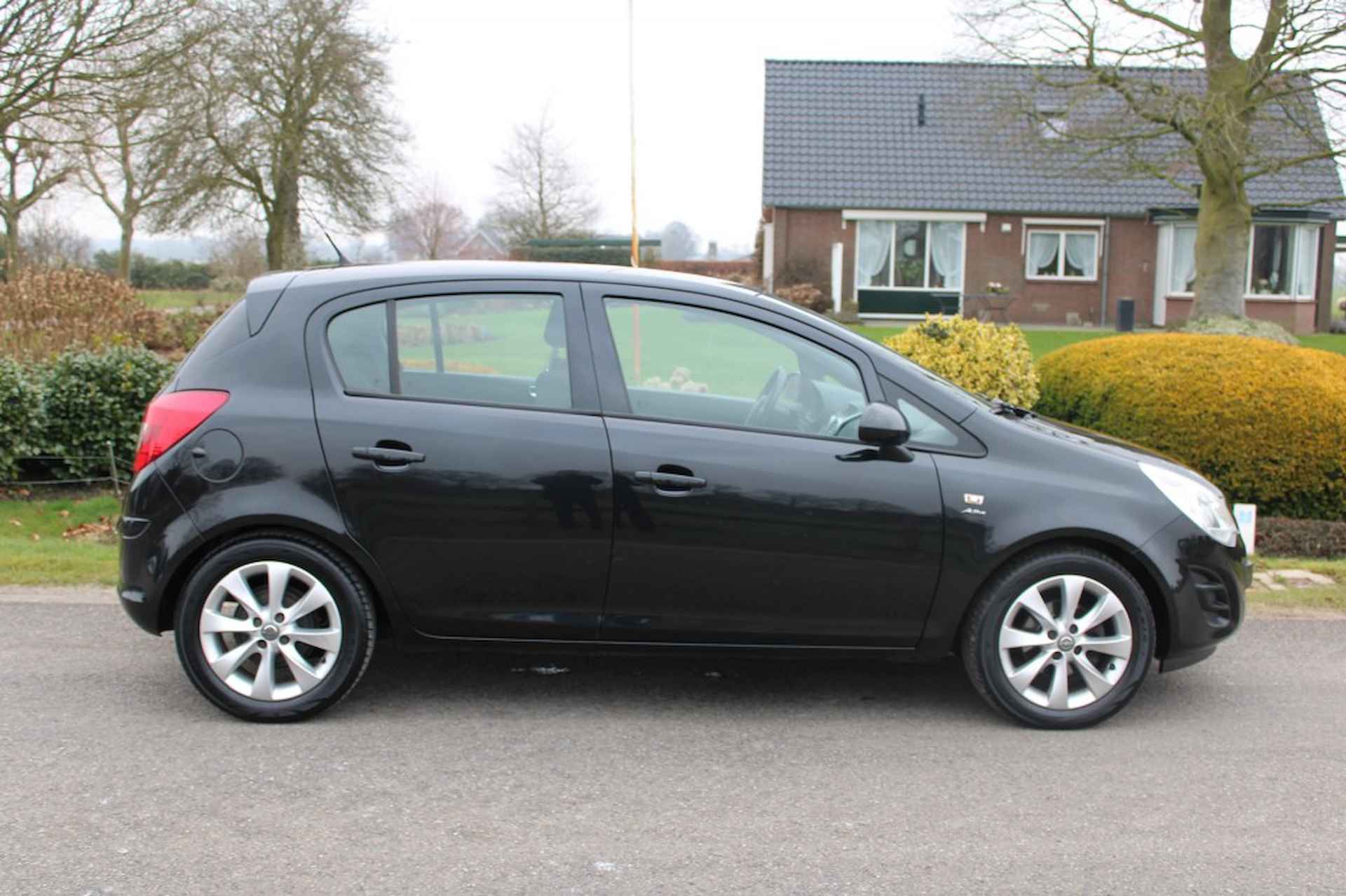 OPEL Corsa 1.4-16V 87pk airco/cruise/lm velgen/trekhaak - 18/31