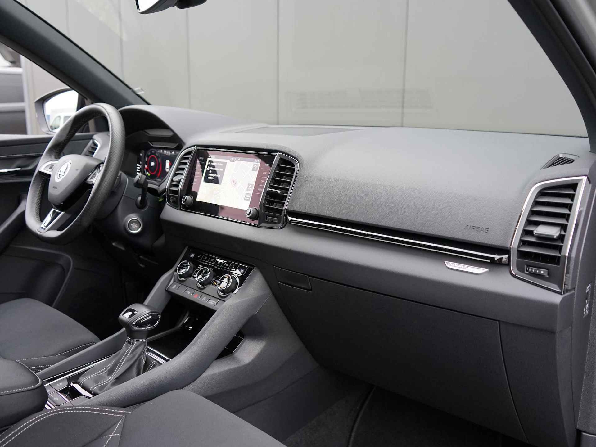 Skoda Karoq 1.5 TSI ACT Sportline Business Virtual cockpit /  Navi / Adap. cruise / 1ste eigenaar /  Dealer onderh. / Dodehoek / - 15/30