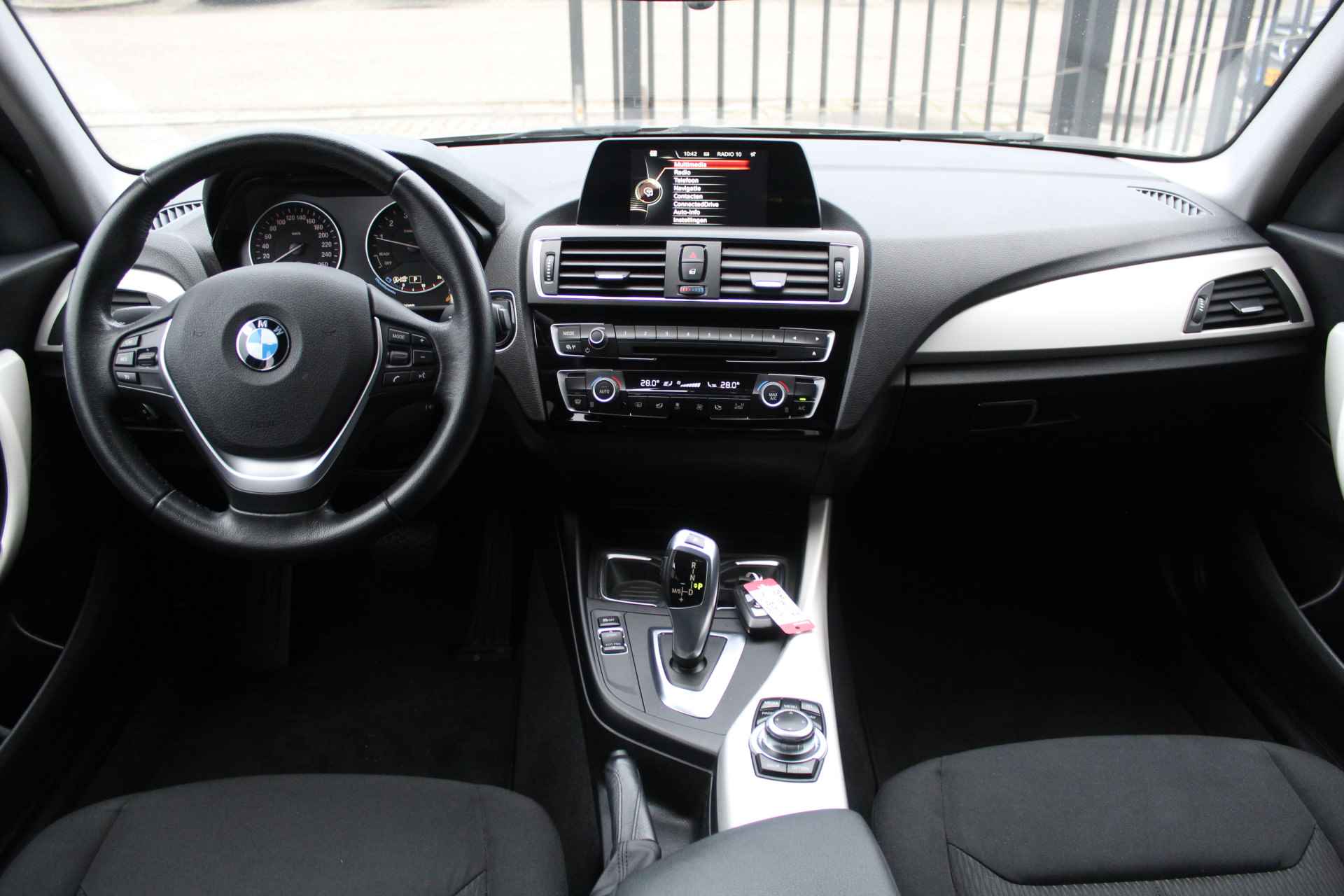 BMW 1-serie 118i EDE Corporate Lease Essential Automaat Cruise Control/Navigatie/Climate Control/Airco/Parkeersensoren/Bluetooth/Origineel N - 12/25