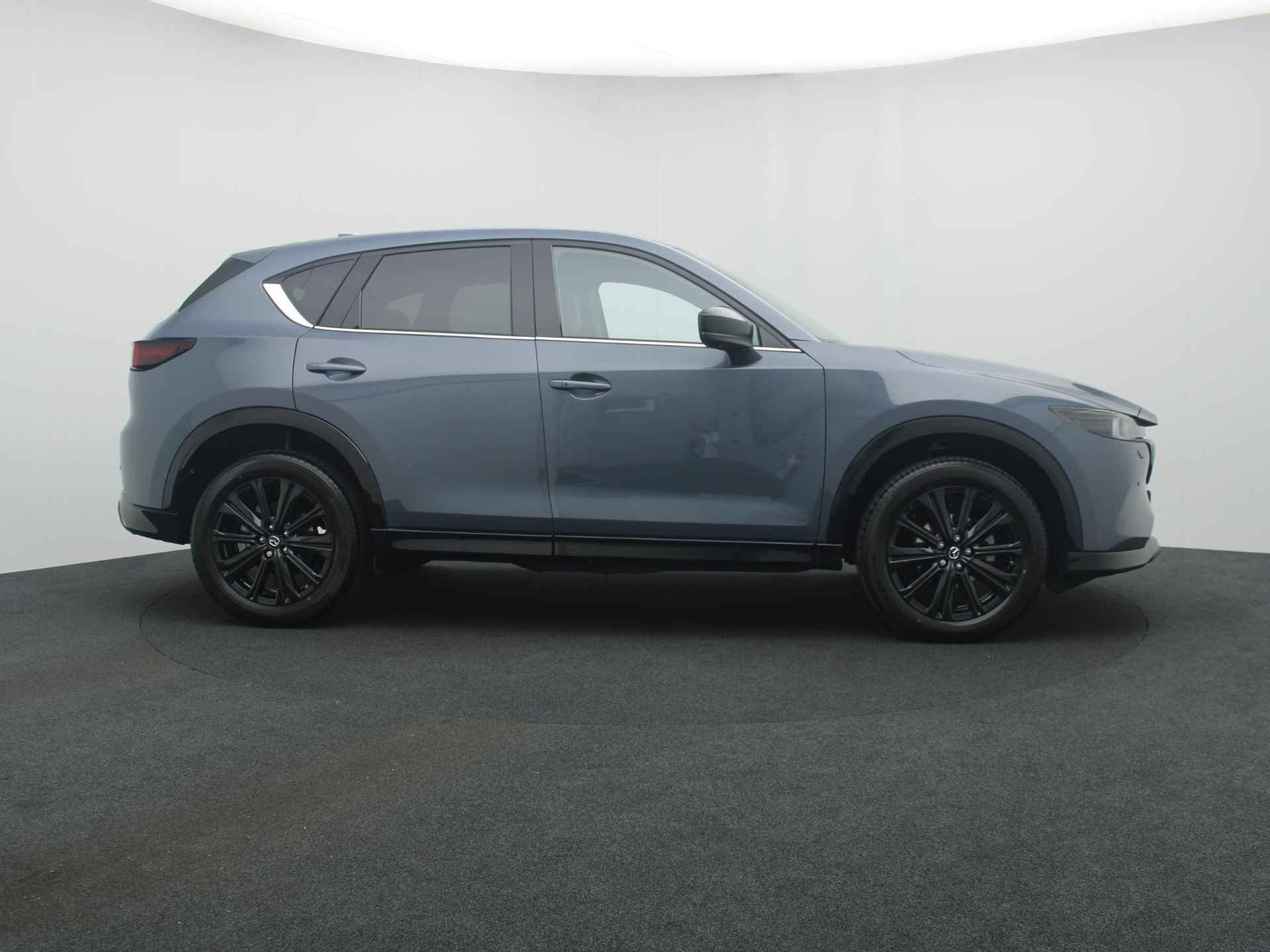 Mazda CX-5 2.0 e-SkyActiv-G Homura automaat met Black Comfort Pack | demo voordeel - 7/48