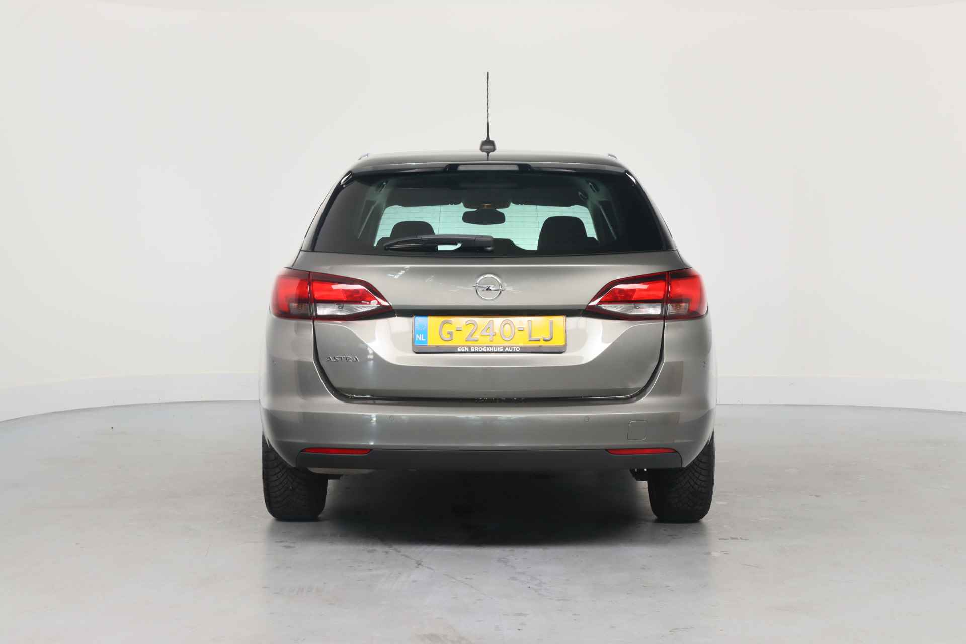 Opel Astra Sports Tourer 1.0 Turbo 120 Jaar Edition | Dealer Onderhouden! | Navi | Clima | Parkeersensoren V+A | Cruise Control | 16'' Lich - 3/32