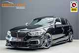 BMW 1-serie M140i 437pk xDrive High Executive |Akrapovic|KW schroefset|stage 2 tuning|schuif/kanteldak|memory|Harman Kardon|camera|rijstrook|