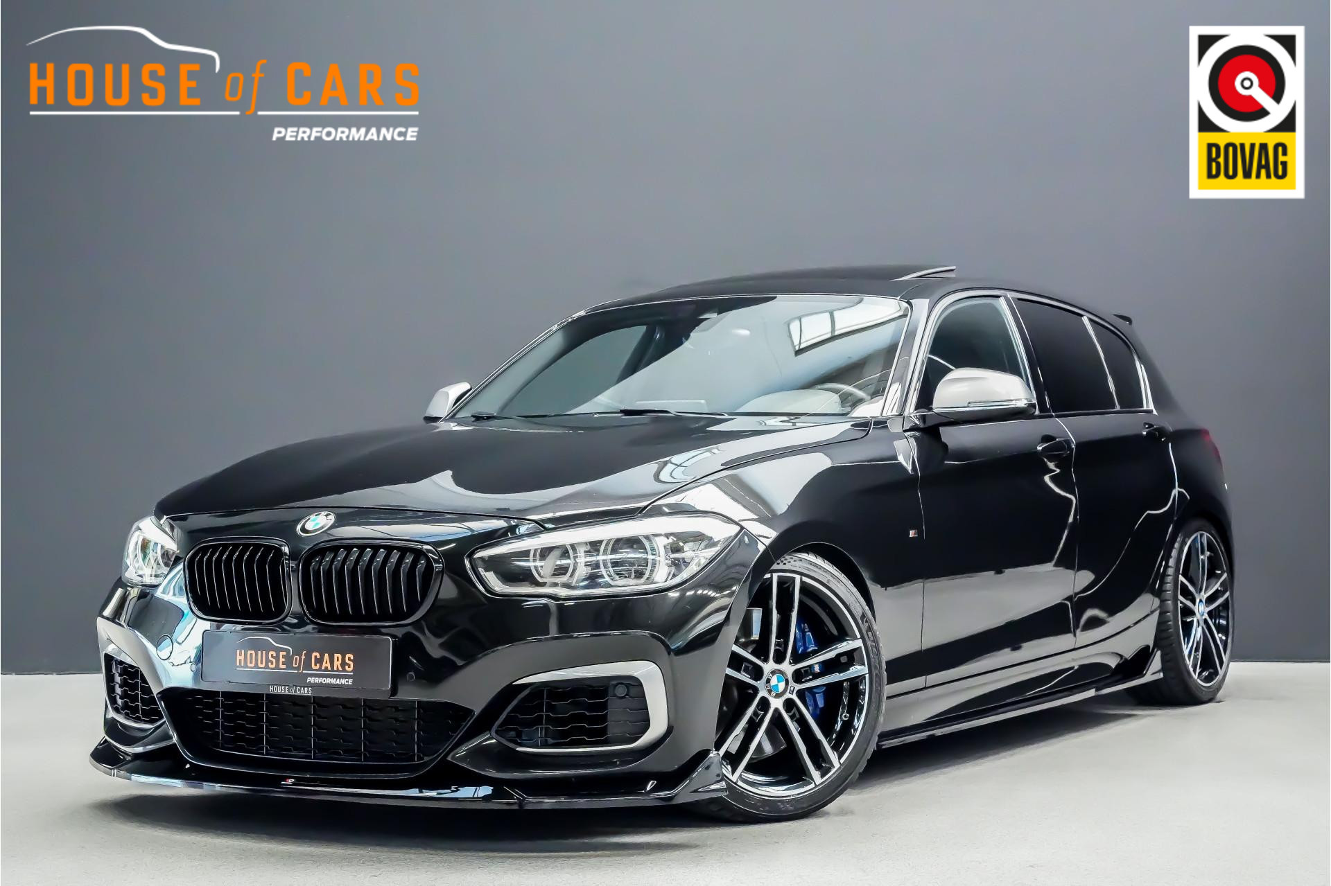 BMW 1-serie M140i 437pk xDrive High Executive |Akrapovic|KW schroefset|stage 2 tuning|schuif/kanteldak|memory|Harman Kardon|camera|rijstrook|