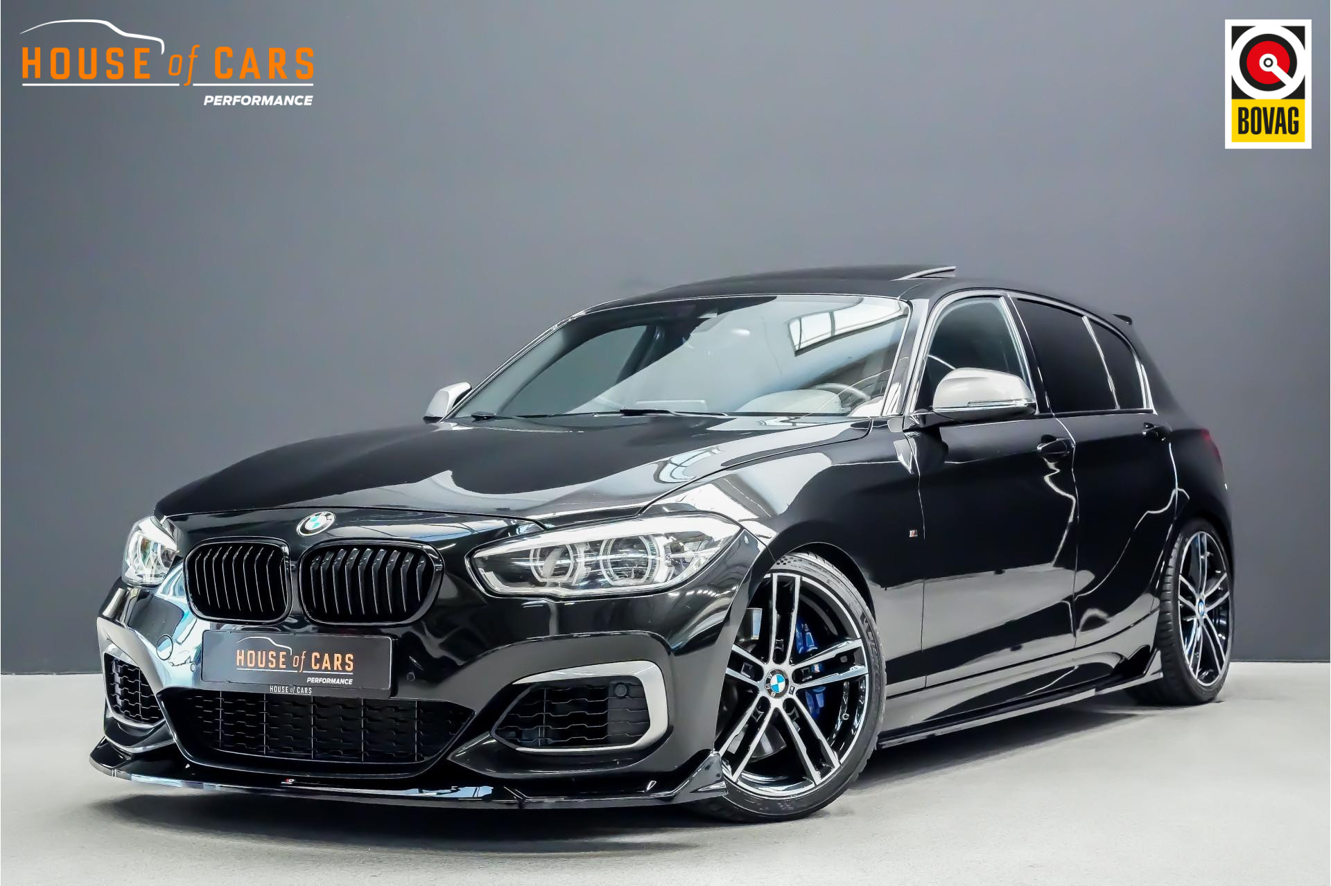 BMW 1-serie M140i 437pk xDrive High Executive |Akrapovic|KW schroefset|stage 2 tuning|schuif/kanteldak|memory|Harman Kardon|camera|rijstrook|