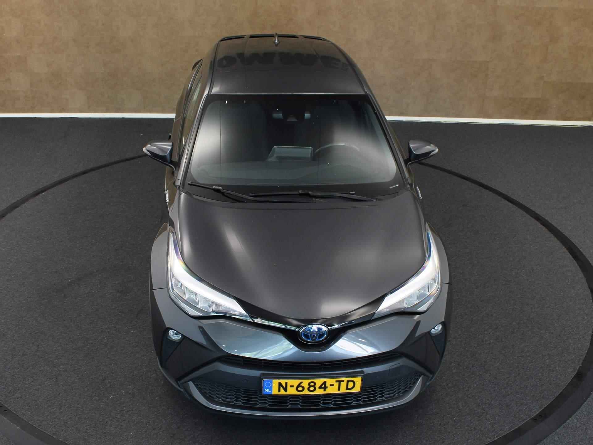 Toyota C-HR 1.8 Hybrid Dynamic - NAVIGATIE - KEYLESS ENTRY & START - PARKEERSENSOREN VOOR EN ACHTER - DODEHOEK DETECTIE - ADAPTIVE CRUISE CONTROL - ACHTERUITRIJ CAMERA - CLIMATE CONTROL - 12/32