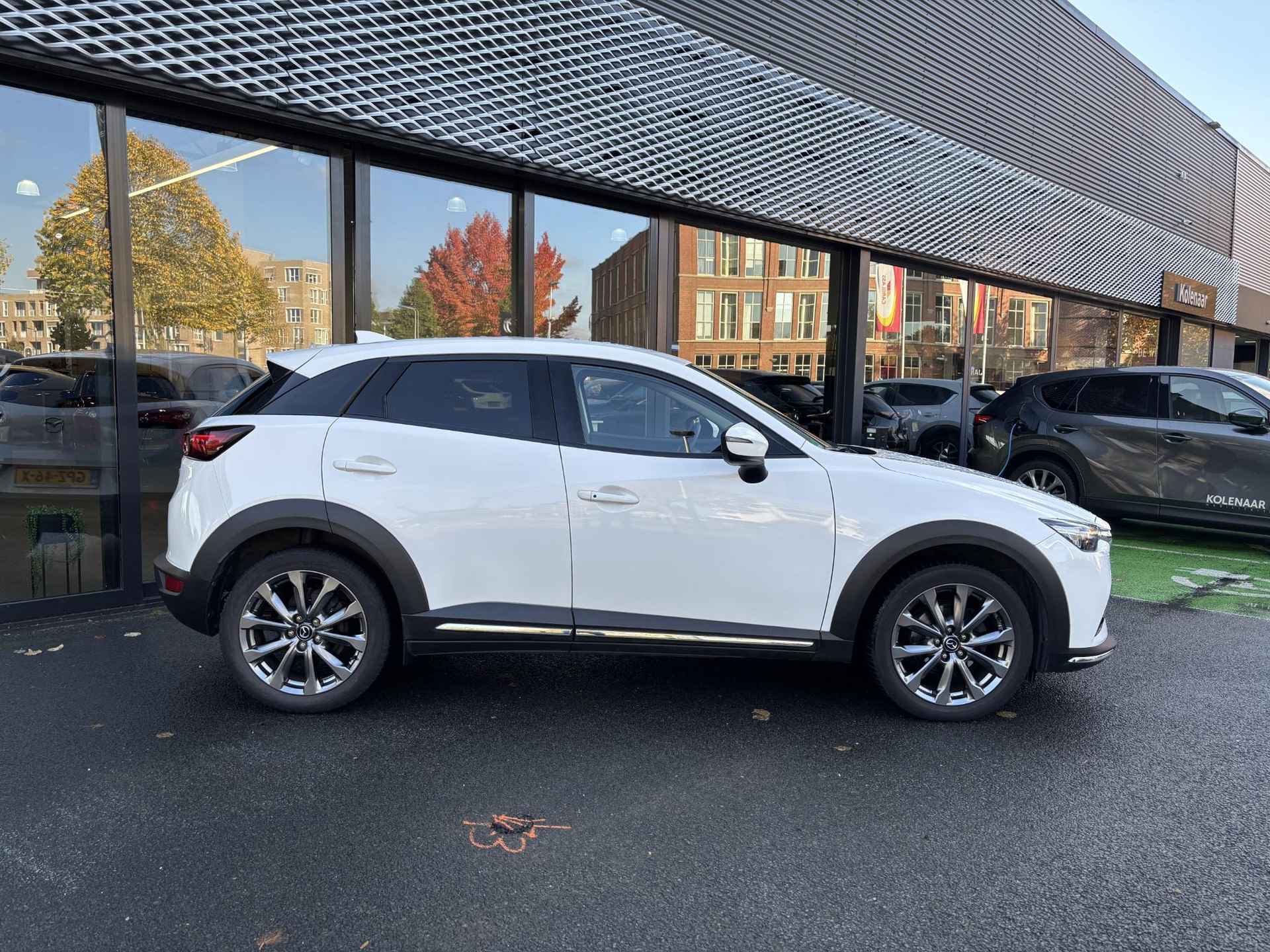 Mazda CX-3 Automaat 2.0 Sky-G 120 Signature-Line /Volledig onderhouden/Navi/HUD/Keyless/ECC/Nappa leder/CarPlay - 2/37