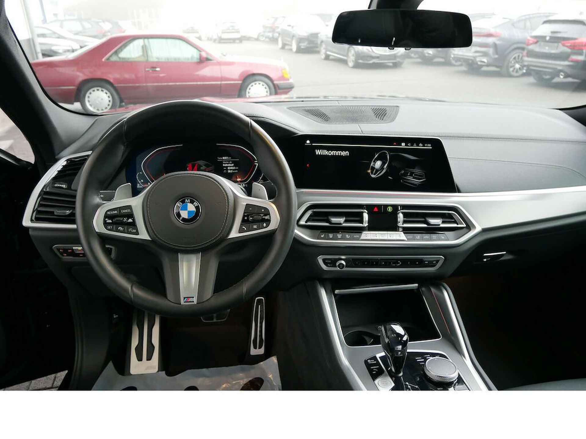 BMW X6 xDrive30d 286 PK M-Sport Panoramadak 20 Inch Live Cockpit Leder Zwart - 7/14