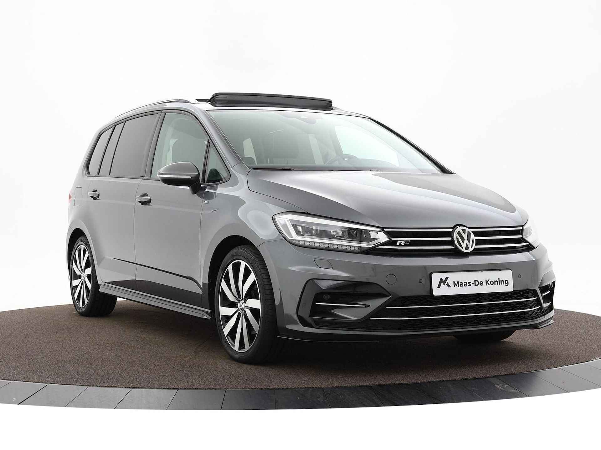 Volkswagen Touran 1.5 TSI 150pk DSG Highline 7p. · Panoramadak · Camera · Side Assist · Inklap Trekhaak · R-Line Exterieur · Keyless · Stoelverwarming · 18"Velgen · ACC · - 23/43