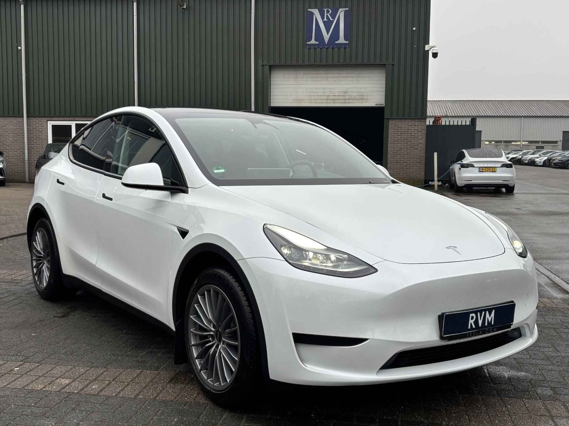 Tesla Model Y RWD 58 kWh TOP STAAT - FABRIEKSGARANTIE TOT 6-2027 - ALL SEASON BANDEN - 4/28