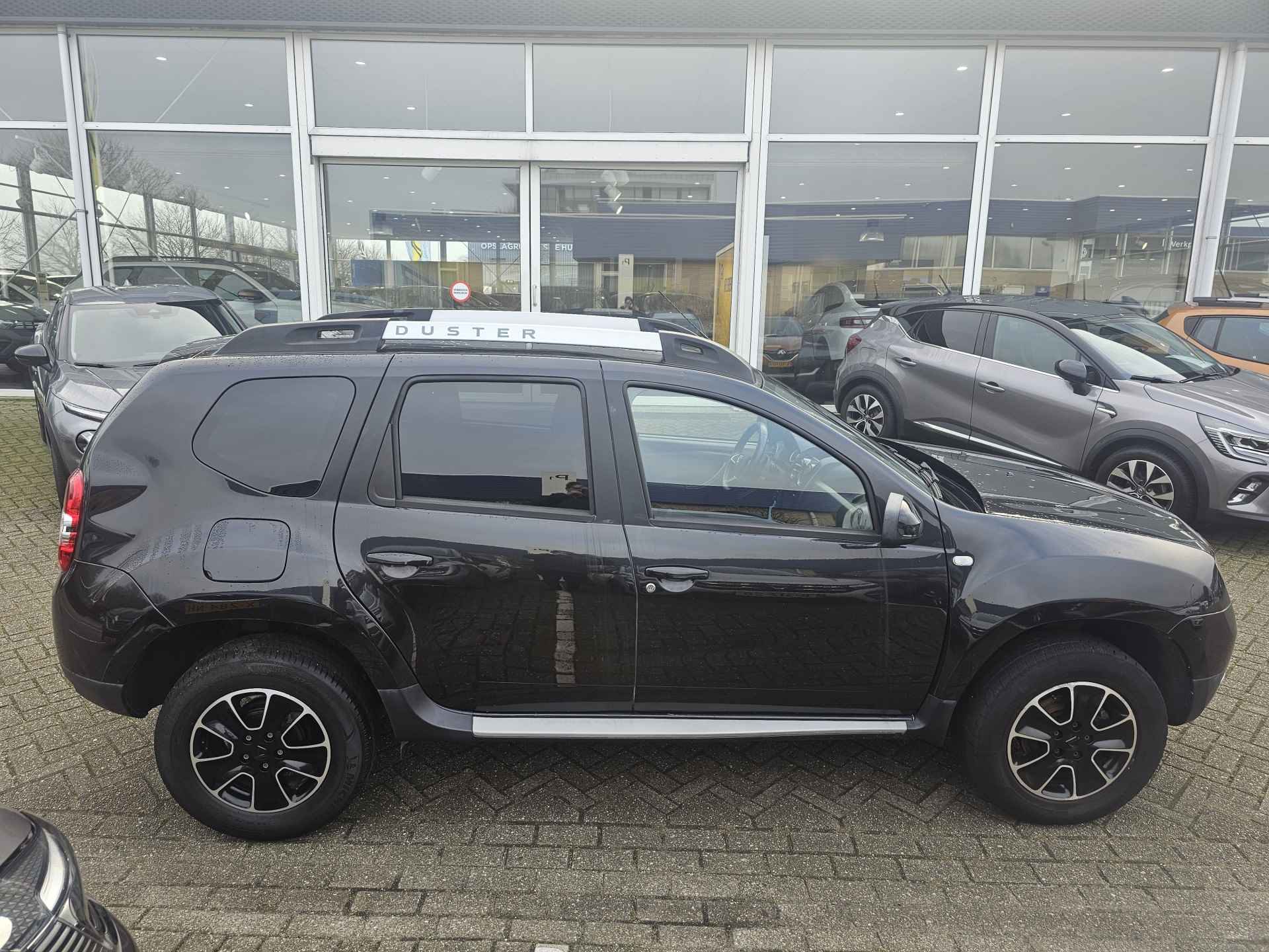 Dacia Duster 1.2 TCe 125 pk 4x2 Blackshadow | Airco | Navigatie | Leder | Stoelverwarming | 1.500 kg trekgewicht | incl. Bovag rijklaarpakket met 12 maanden garantie | - 7/31