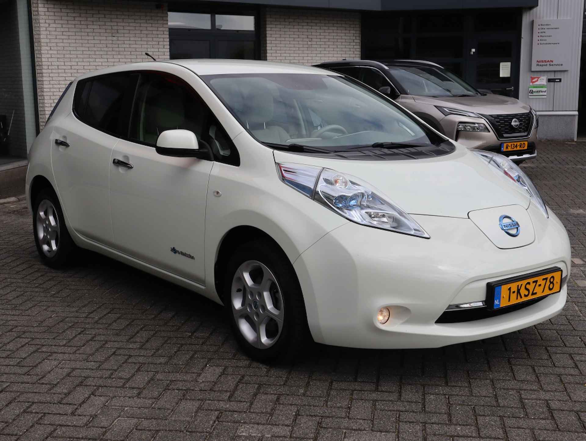 Nissan LEAF Base 24 kWh / lage kilometerstand / Navigatie / Parkeercamera - 7/24