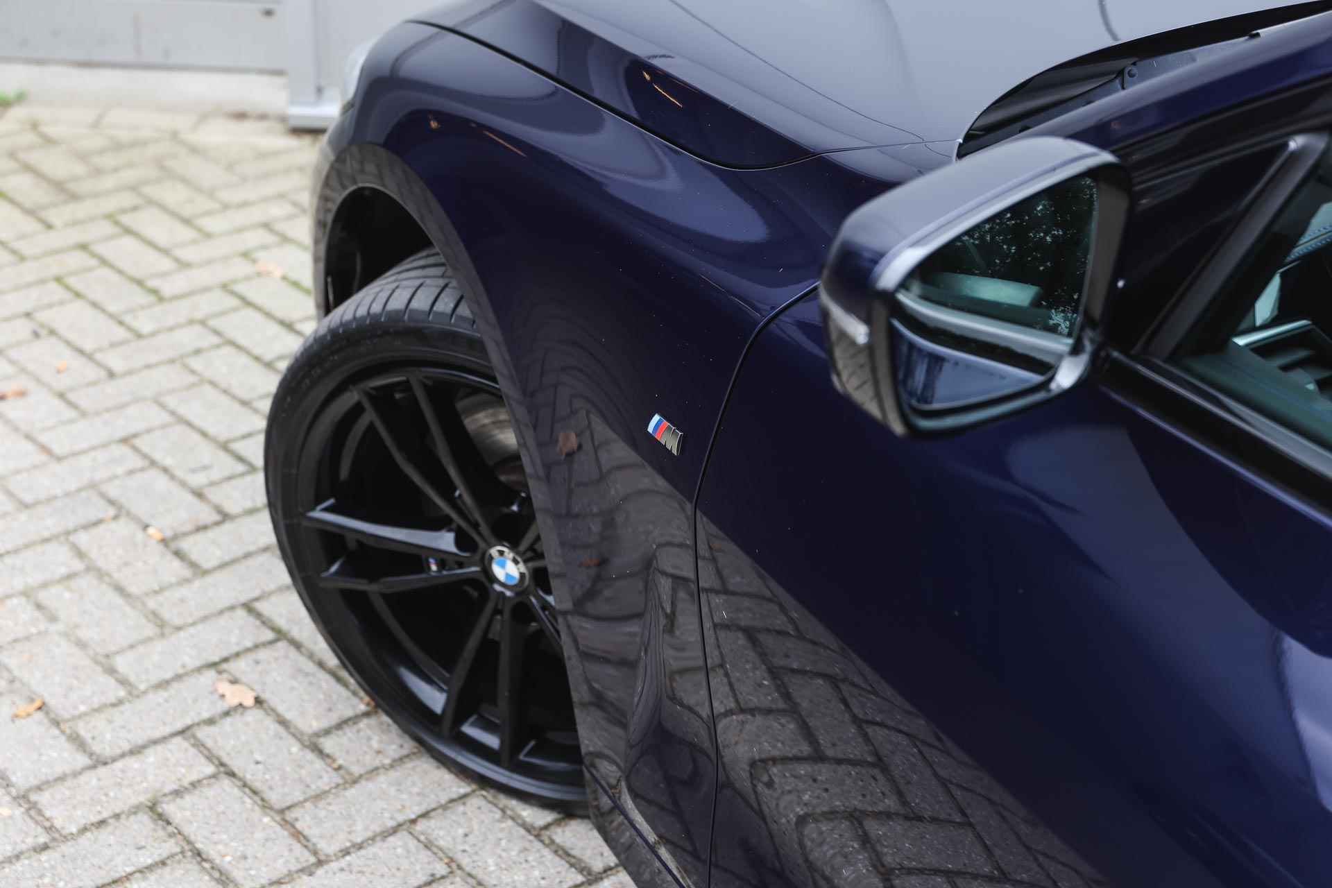 BMW 4 Serie Coupé M440i xDrive High Executive Automaat / Schuif-kanteldak / Laserlicht / M Sportstoelen / Parking Assistant Plus / Adaptief M onderstel / Comfort Access - 38/42