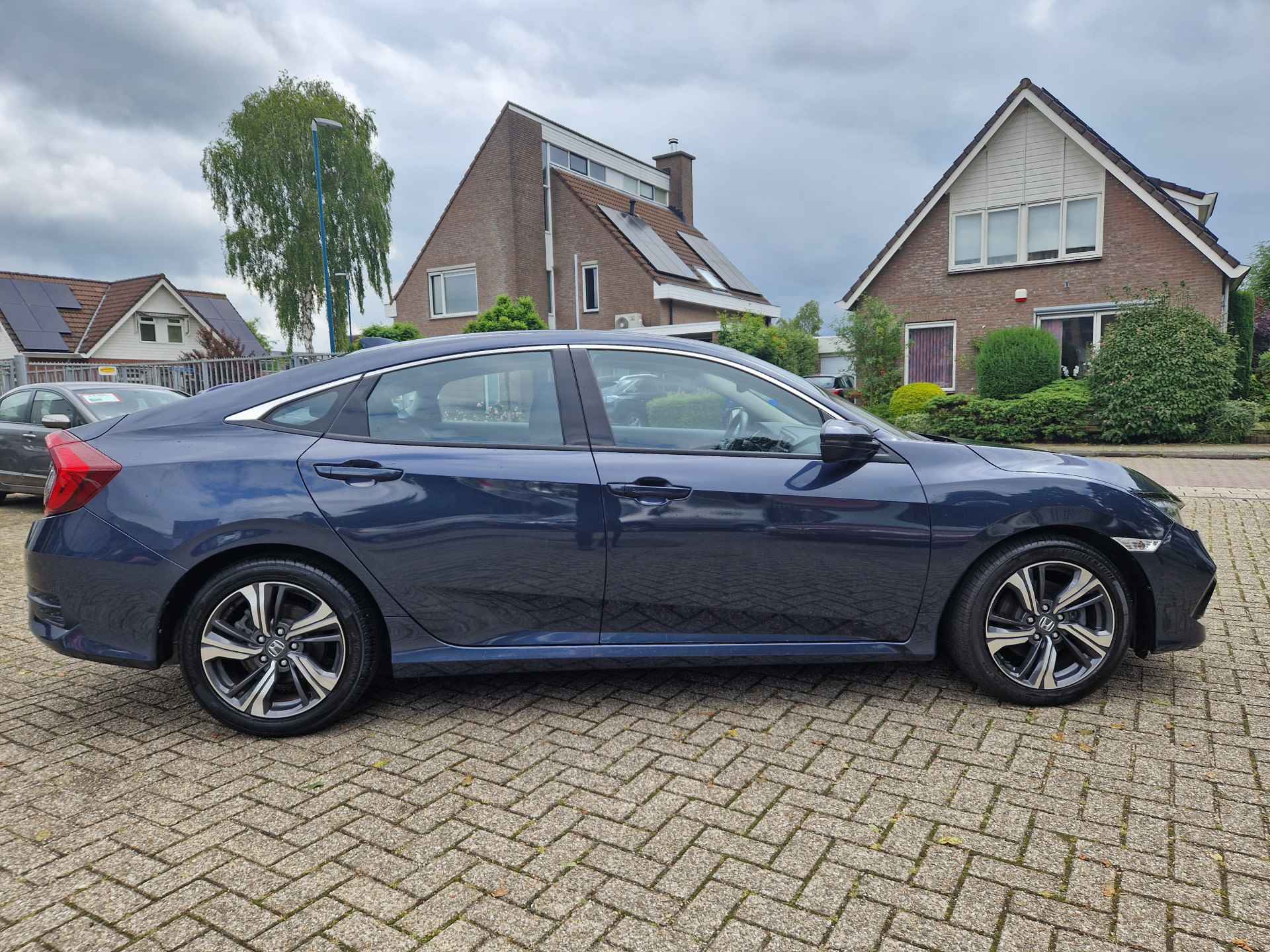 Honda Civic 1.5 i-VTEC Executive Navigatie, Panoramadak , All-in Rijklaarprijs - 26/29