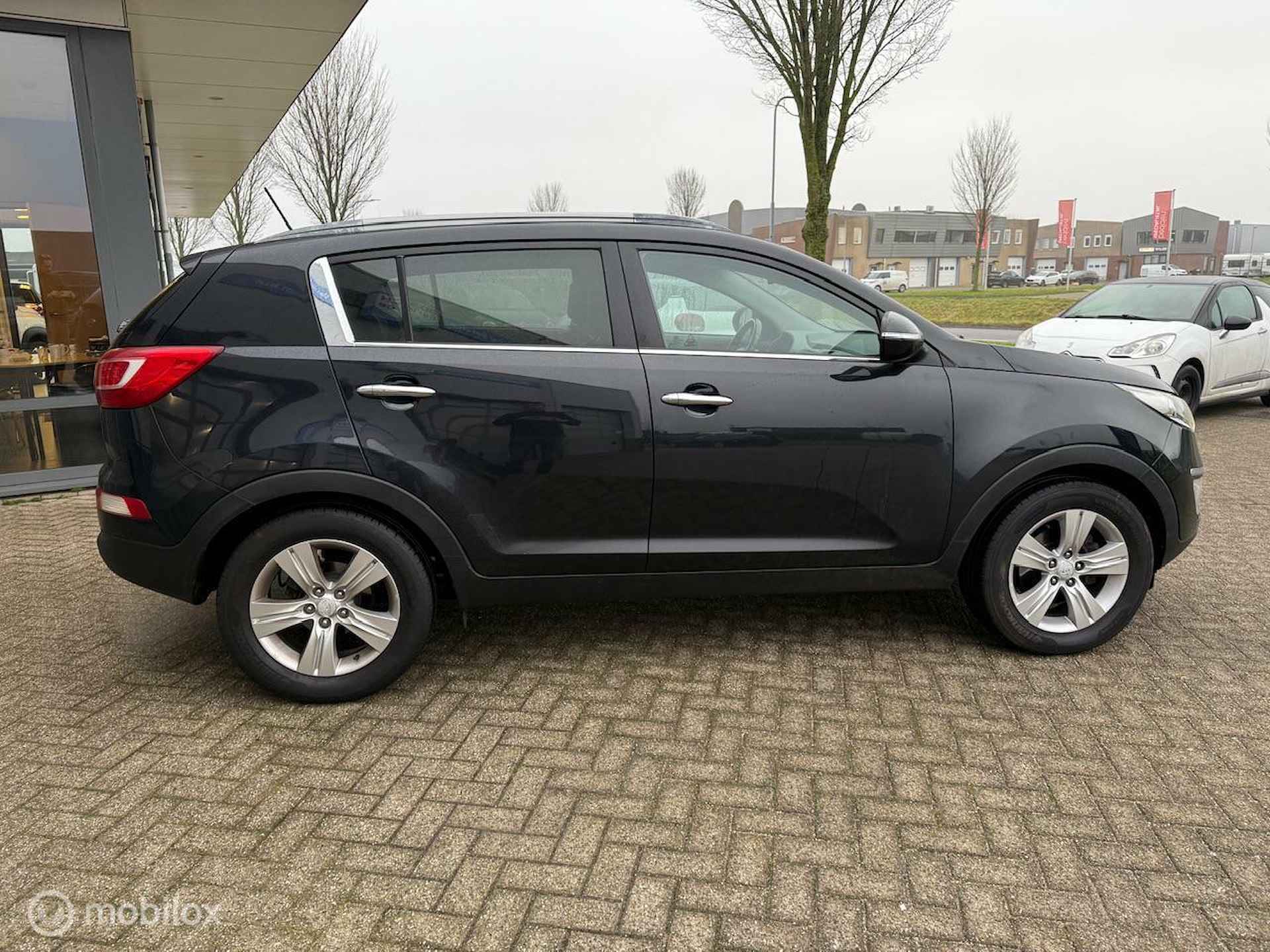 KIA SPORTAGE 2.0 163 PK AUTOMAAT XECUTIVE PLUS PACK 12 MND BOVAG RIJKLAAR PRIJS - 3/13