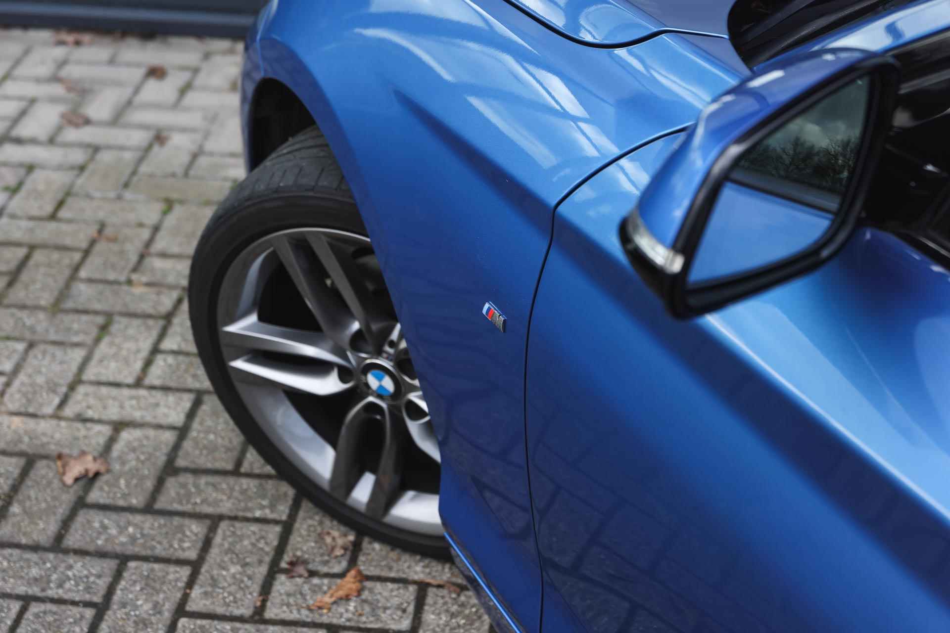 BMW 1-serie 118i Executive M Sport Automaat / Sportstoelen / Active Cruise Control / LED / Comfort Access / M Sportonderstel / Leder - 28/31