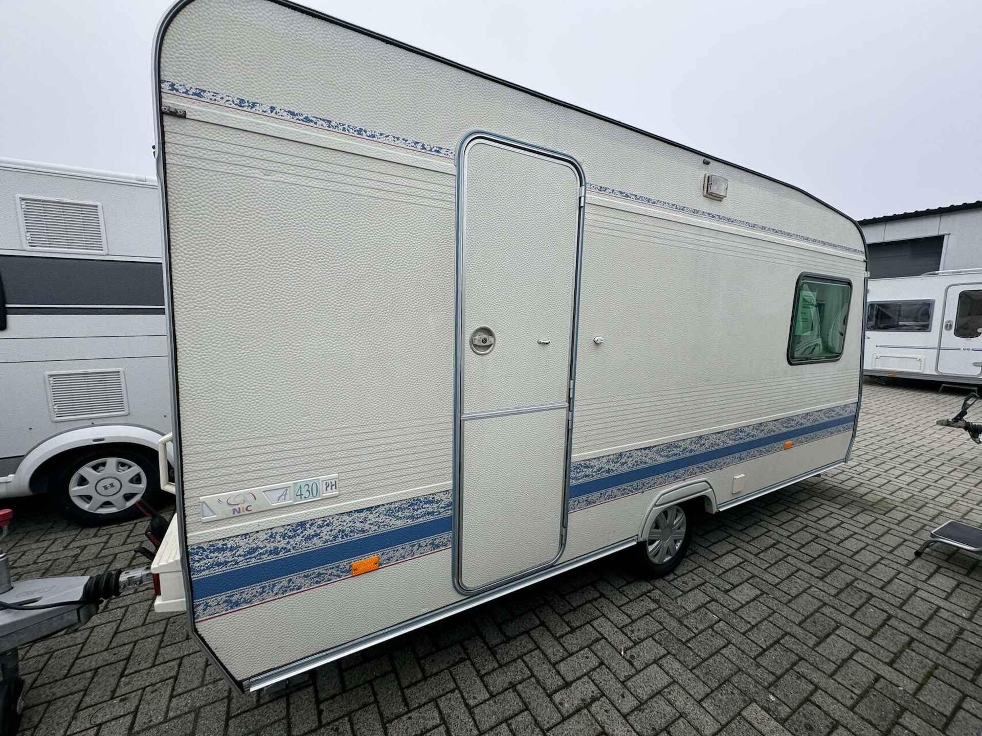 ADRIA UNICA 430 PH DWARSBED + TREINZIT + VOORTENT + BOILER - 6/15