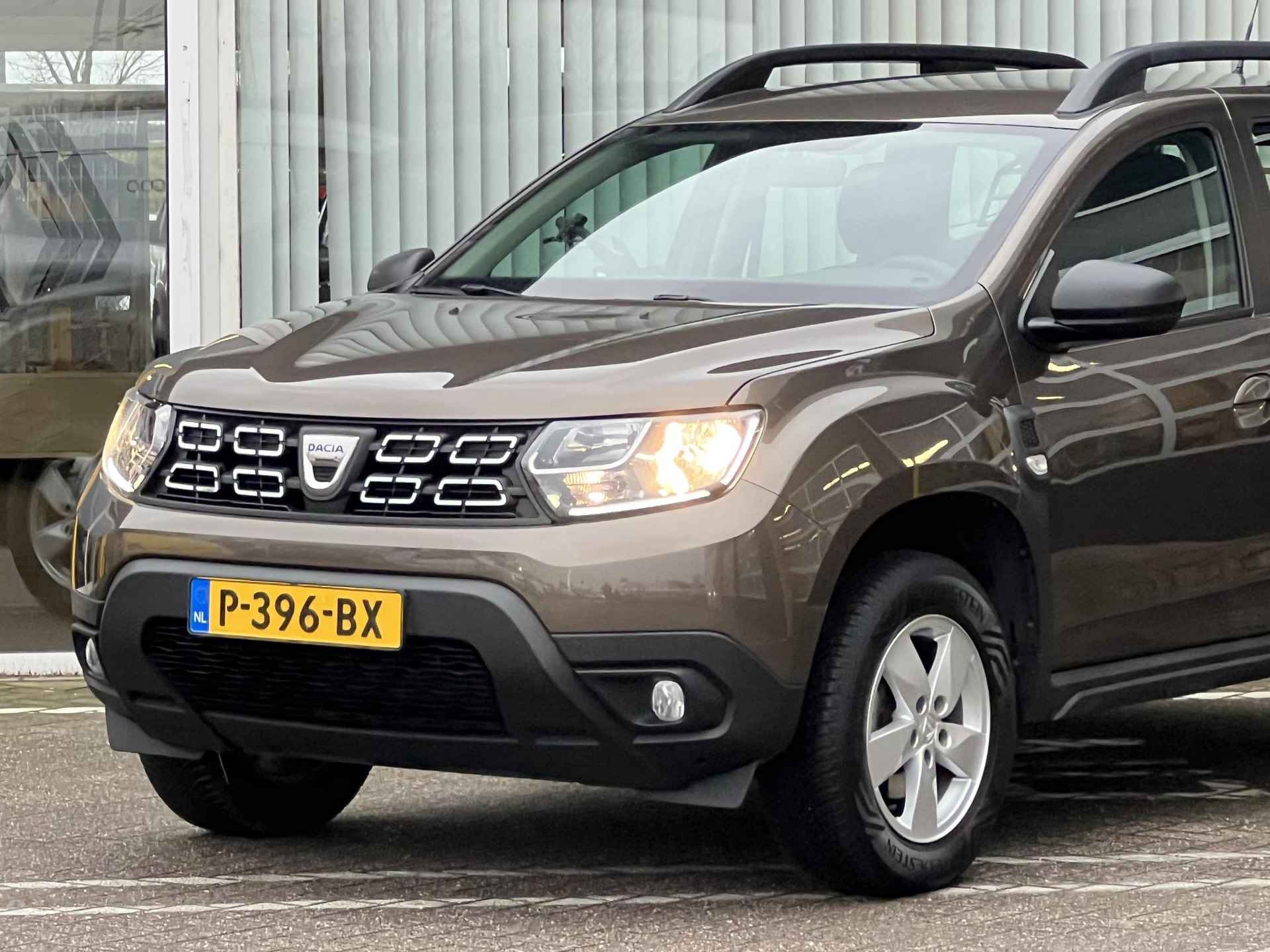 Dacia Duster 1.0 TCe Comfort | Trekhaak | Stoelverwarming | Parkeersensoren | Airco | Lichtmetaal | Cruise Control | BT-Telefoonfunctie | - 4/26