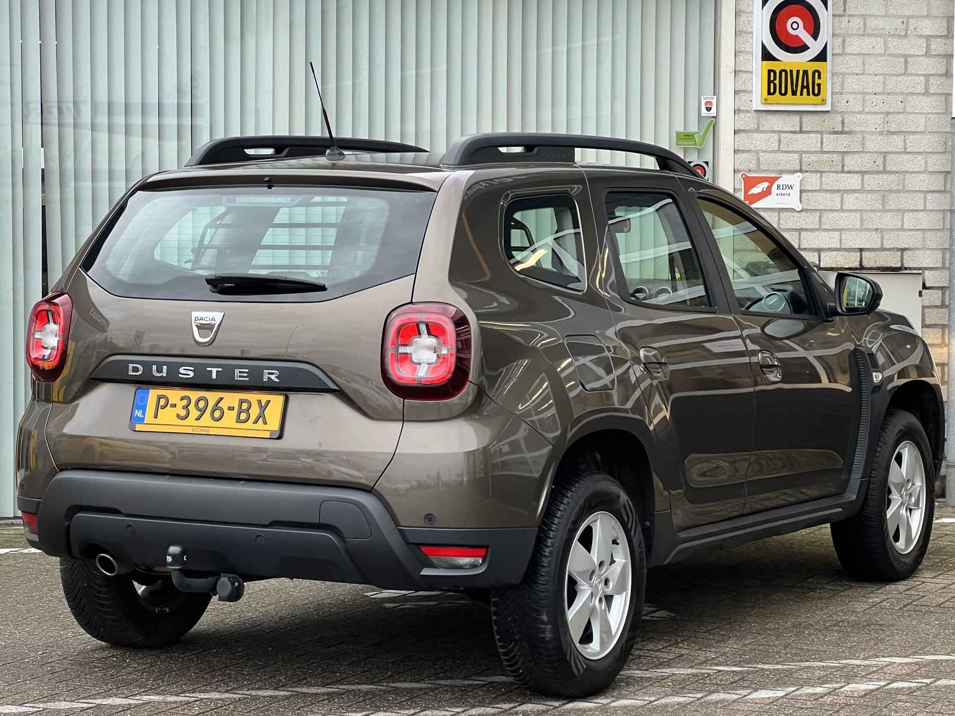 Dacia Duster 1.0 TCe Comfort | Trekhaak | Stoelverwarming | Parkeersensoren | Airco | Lichtmetaal | Cruise Control | BT-Telefoonfunctie | - 24/26