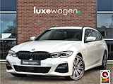 BMW 3 Serie Touring 330e M-Sport Trekh ACC Camera Parelmoer-wit