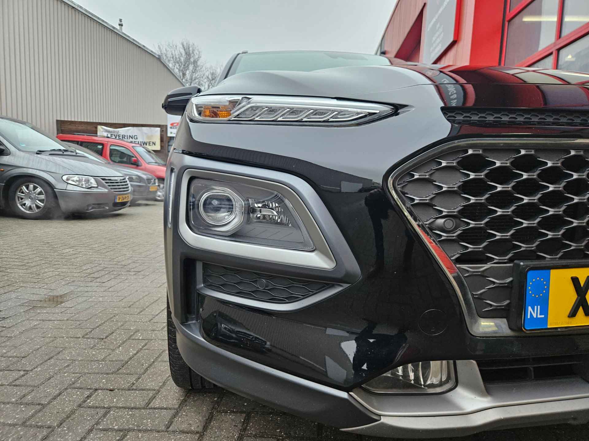 Hyundai Kona 1.0 T-GDI Premium Lederen bekleding/ Stoel-stuurverwarming/Navigatie/ Rijklaarprijs! - 12/28