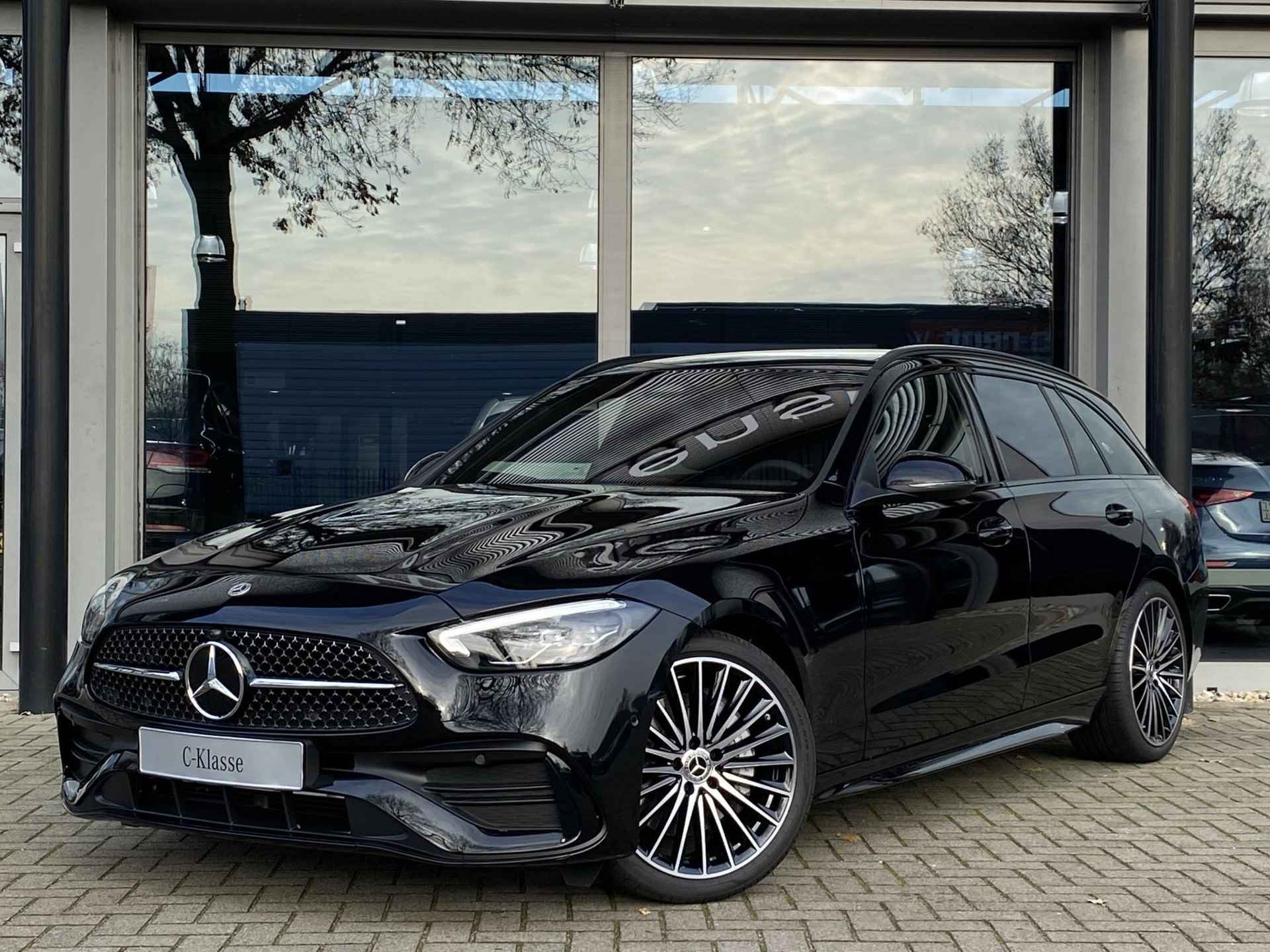 Mercedes-Benz C-klasse 180 Estate AMG Line | Panoramadak | Memory pakket | High-performance LED | Dodehoek-assistent | Sfeerverlichting | Nightpakket | 19" Multispaaks | - 24/32
