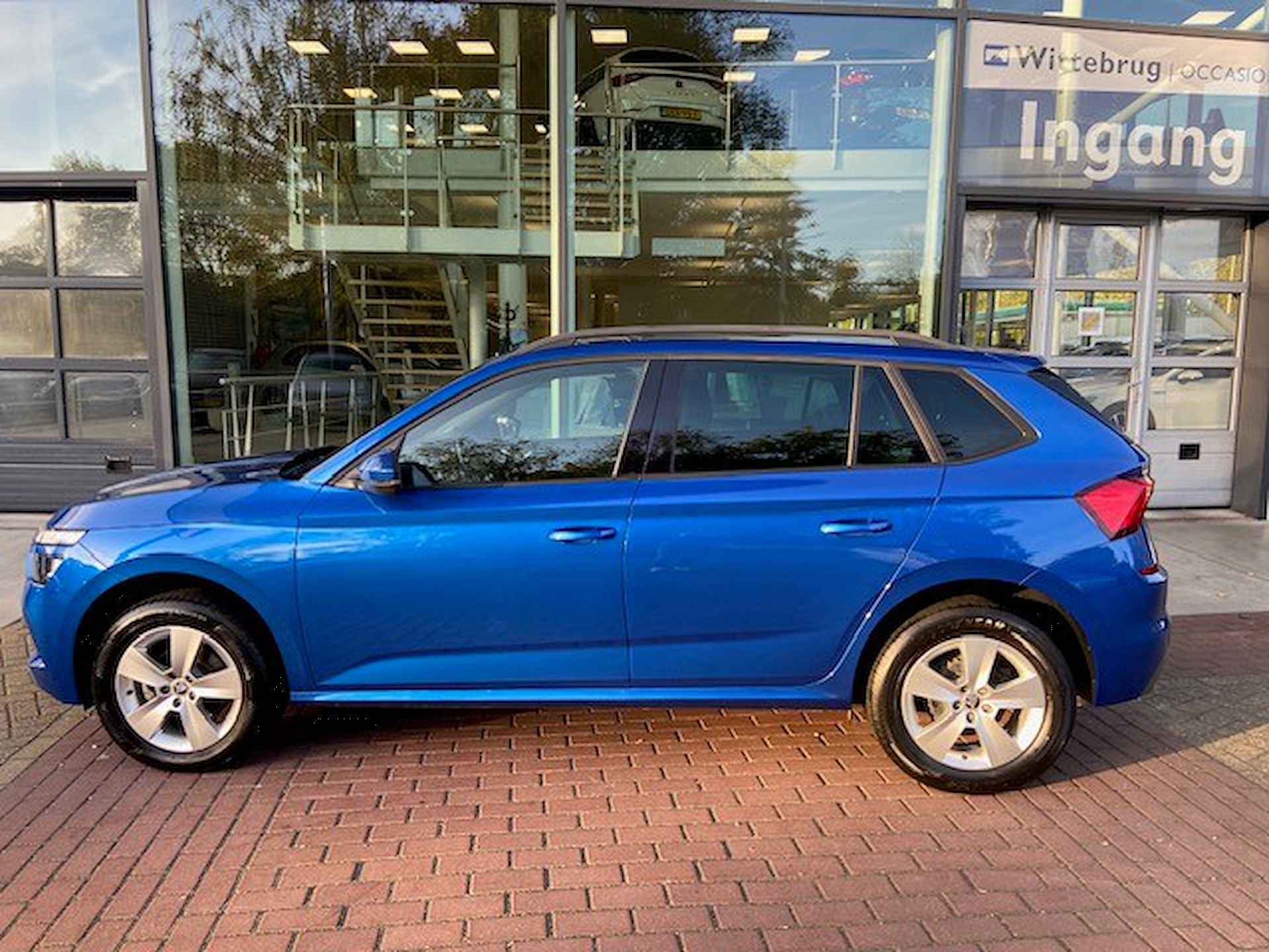 Škoda Kamiq 1.0 TSI Sport Business DSG/ Metallic/ Led/  Climatronic/ APP/ Parkeersensor V. + A./   16 lmv - 6/24