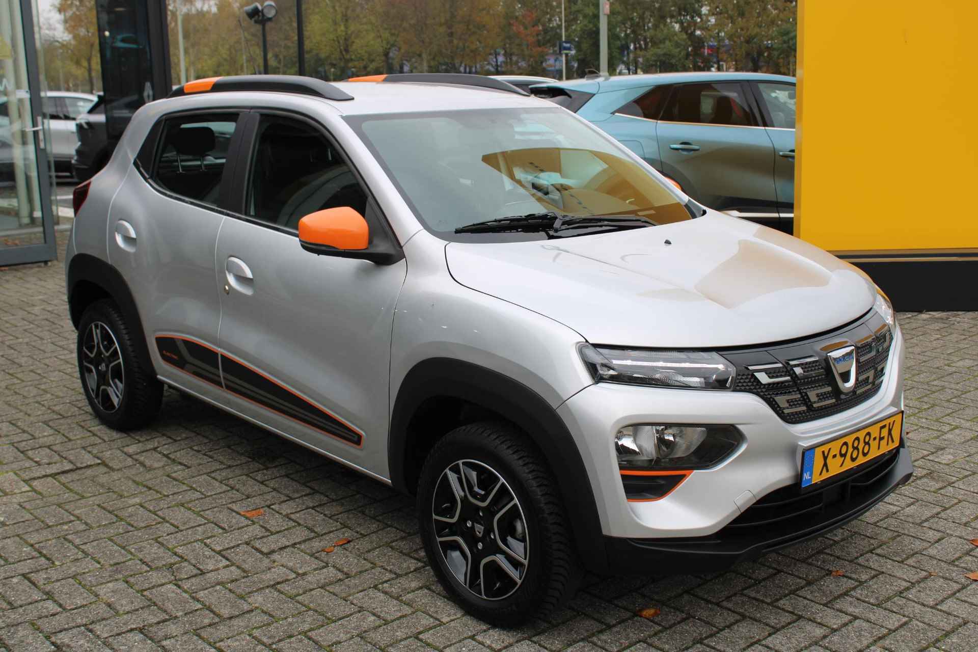 Dacia Spring Expression 27 kWh Orange Pack |  €.2.000,- Overheidssubsidie Beschikbaar | - 12/22