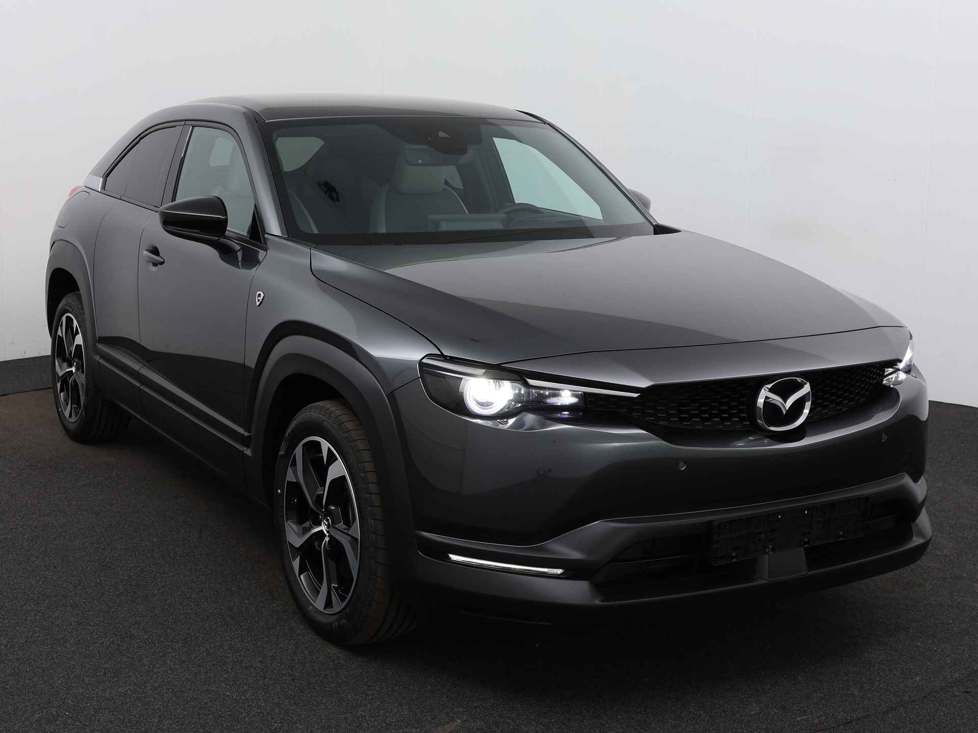 Mazda MX-30 e-SkyActiv R-EV 170 Advantage | Incl. € 4.000,- instapvoordeel  | Direct leverbaar in verschillende kleuren en uitvoeringen - 22/35