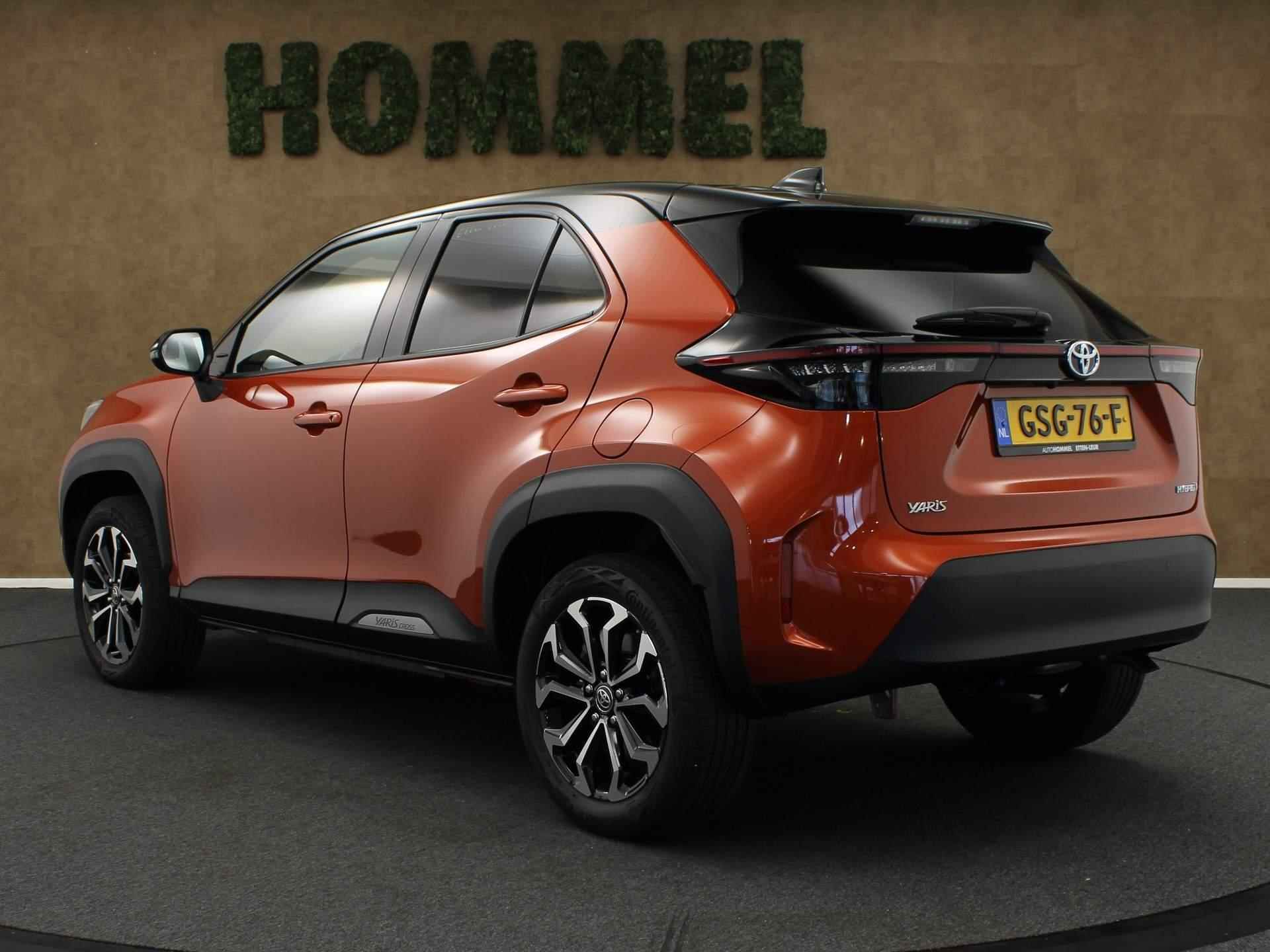 Toyota Yaris Cross 1.5 Hybrid Dynamic - NAVIGATIE - PARKEERSENSOREN VOOR/ ACHTER - DODEHOEK DETECTIE - VOORSTOELEN VERWARMD - VOORRUIT VERWARMD - STUUR VERWARMD - 17 INCH LICHT METALEN VELGEN - ARMSTEUN VOOR - TWO TONE LAK - CLIMATE CONTROL - TELEFOON OPLADER - 8/46