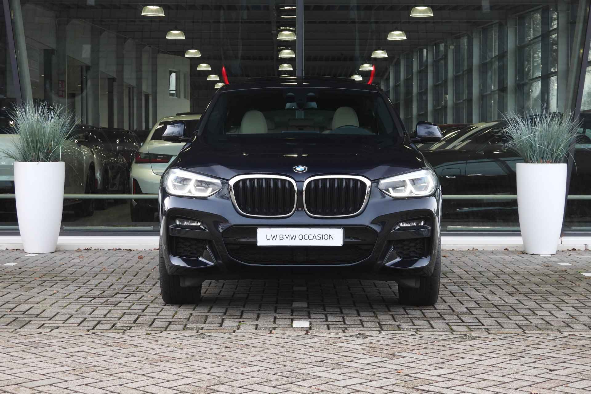 BMW X4 xDrive20i High Executive M Sport Automaat / Panoramadak / Trekhaak / Sportstoelen / Adaptieve LED / Parking Assistant Plus / M Sportonderstel - 5/47