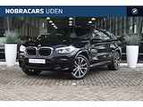 BMW X4 xDrive20i High Executive M Sport Automaat / Panoramadak / Trekhaak / Sportstoelen / Adaptieve LED / Parking Assistant Plus / M Sportonderstel