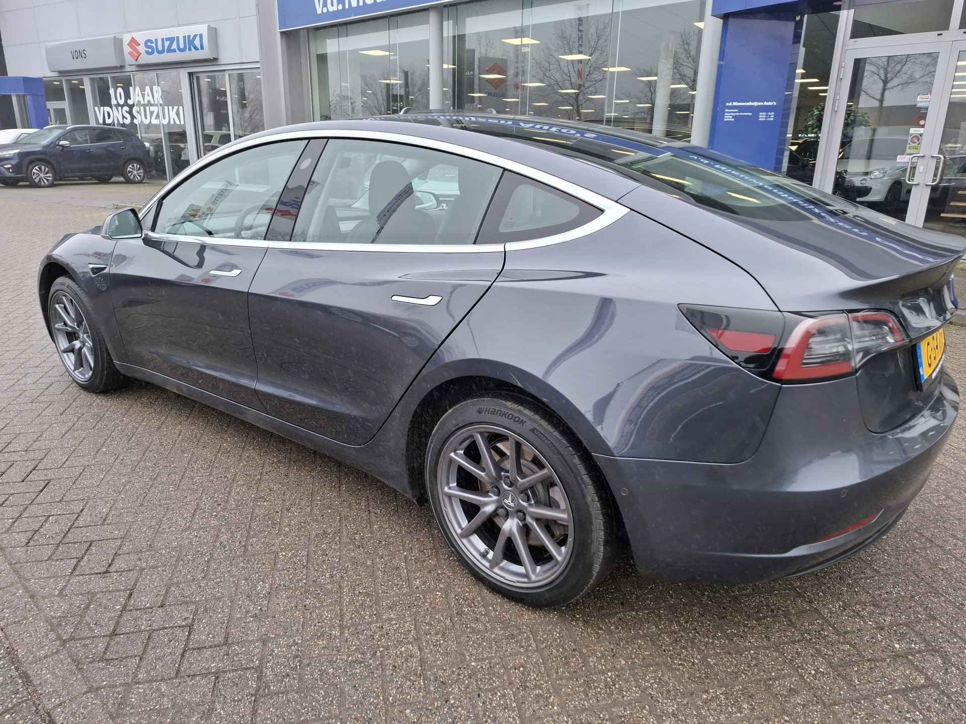 Tesla Model 3 Standard RWD Plus 60 kWh | panoramadak | spraakbediening | camera | climate control | info Jeroen van Erp - 3/28