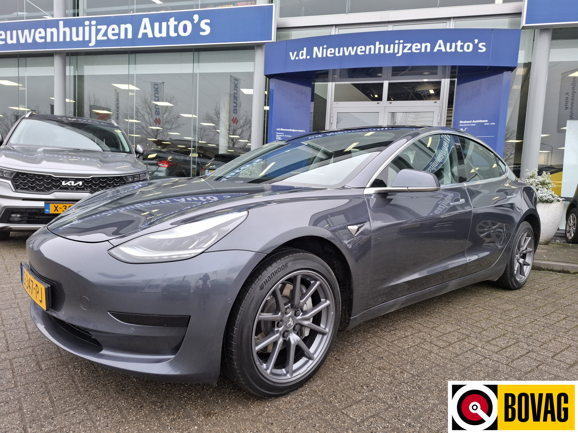 Tesla Model 3 Standard RWD Plus 60 kWh | panoramadak | spraakbediening | camera | climate control | info Jeroen van Erp