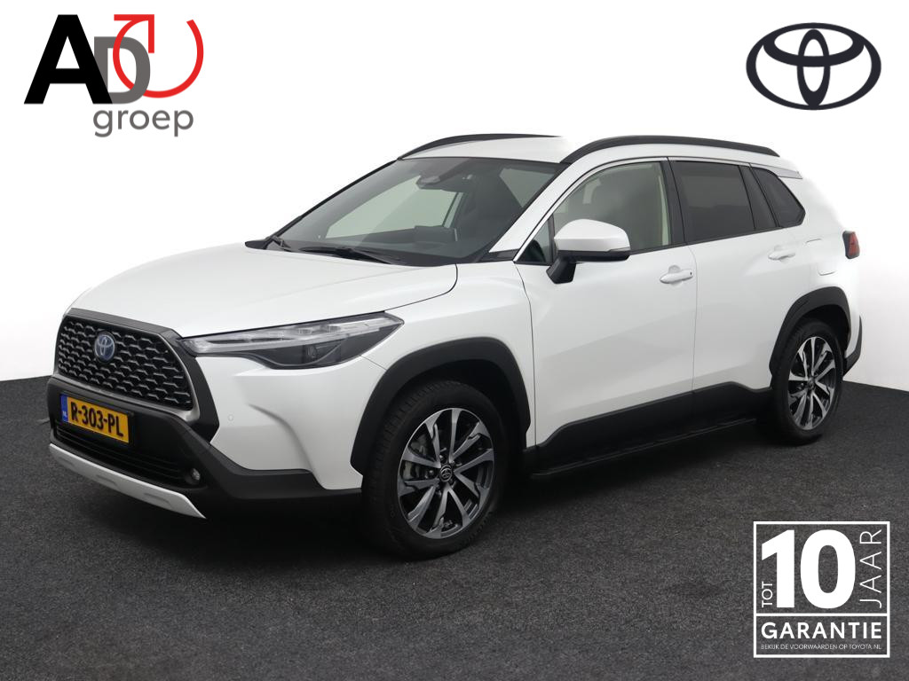 Toyota Corolla Cross 2.0 High Power Hybrid First Edition | Trekhaak | Treeplanken | 1/2 leren bekleding | Wit metallic lak |