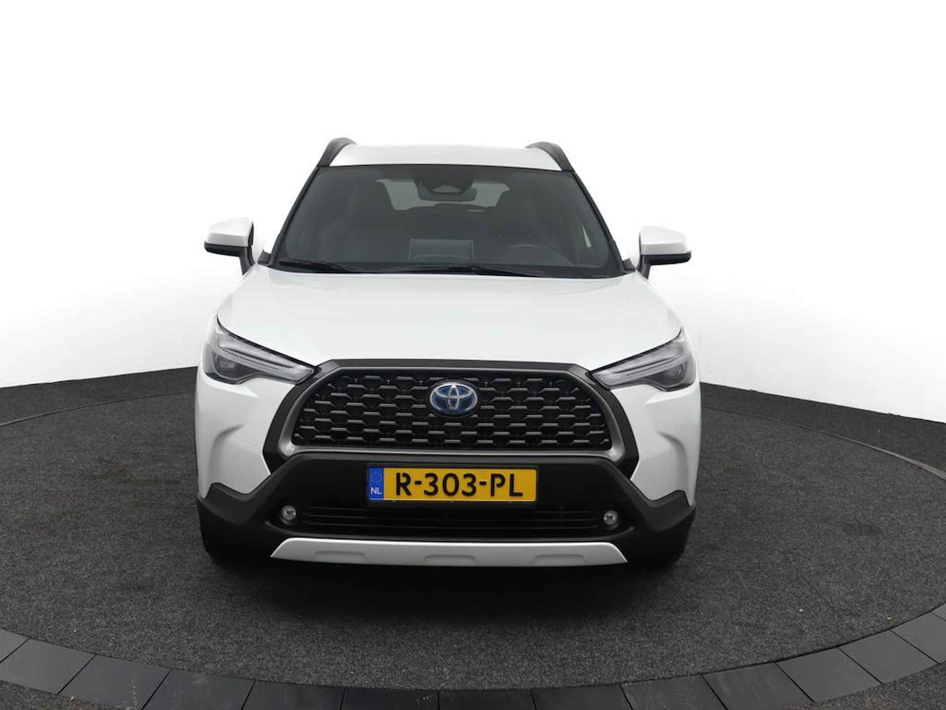 Toyota Corolla Cross 2.0 High Power Hybrid First Edition | Trekhaak | Treeplanken | 1/2 leren bekleding | Wit metallic lak | - 16/49