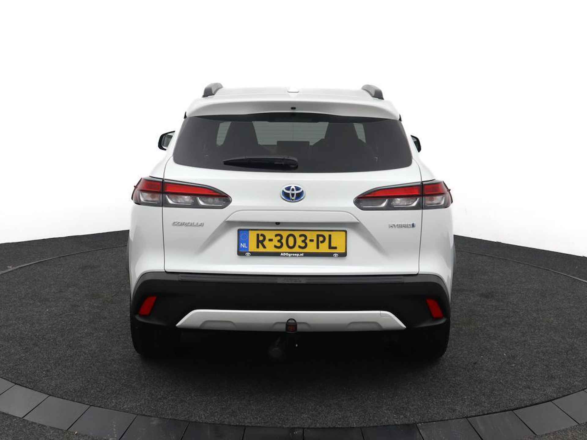 Toyota Corolla Cross 2.0 High Power Hybrid First Edition | Trekhaak | Treeplanken | 1/2 leren bekleding | Wit metallic lak | - 34/49