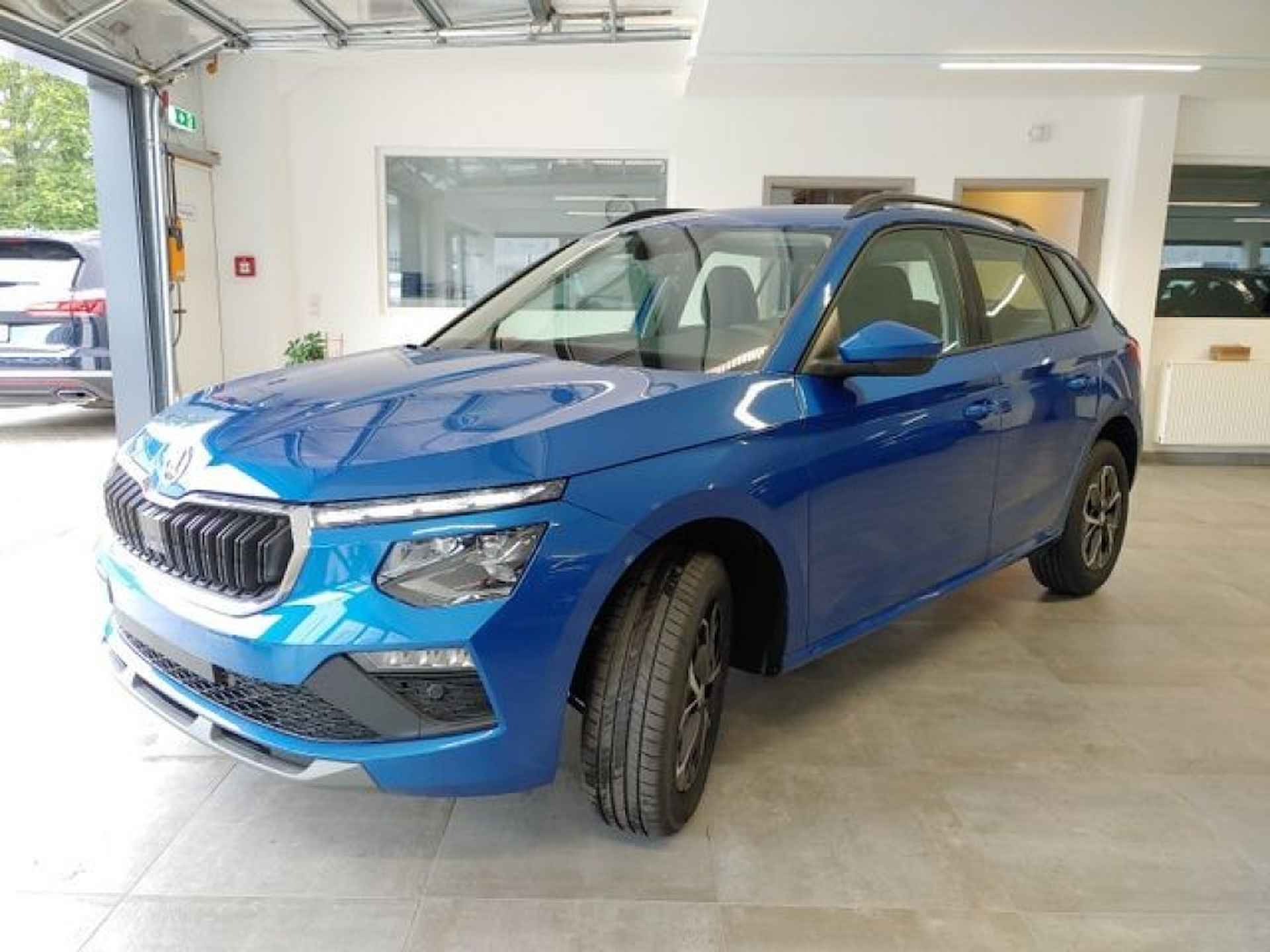 SKODA Kamiq 1.0 TSI DSG SELECTION TREKHAAK/CAMERA/CARPLAY/STOELVERW - 4/17