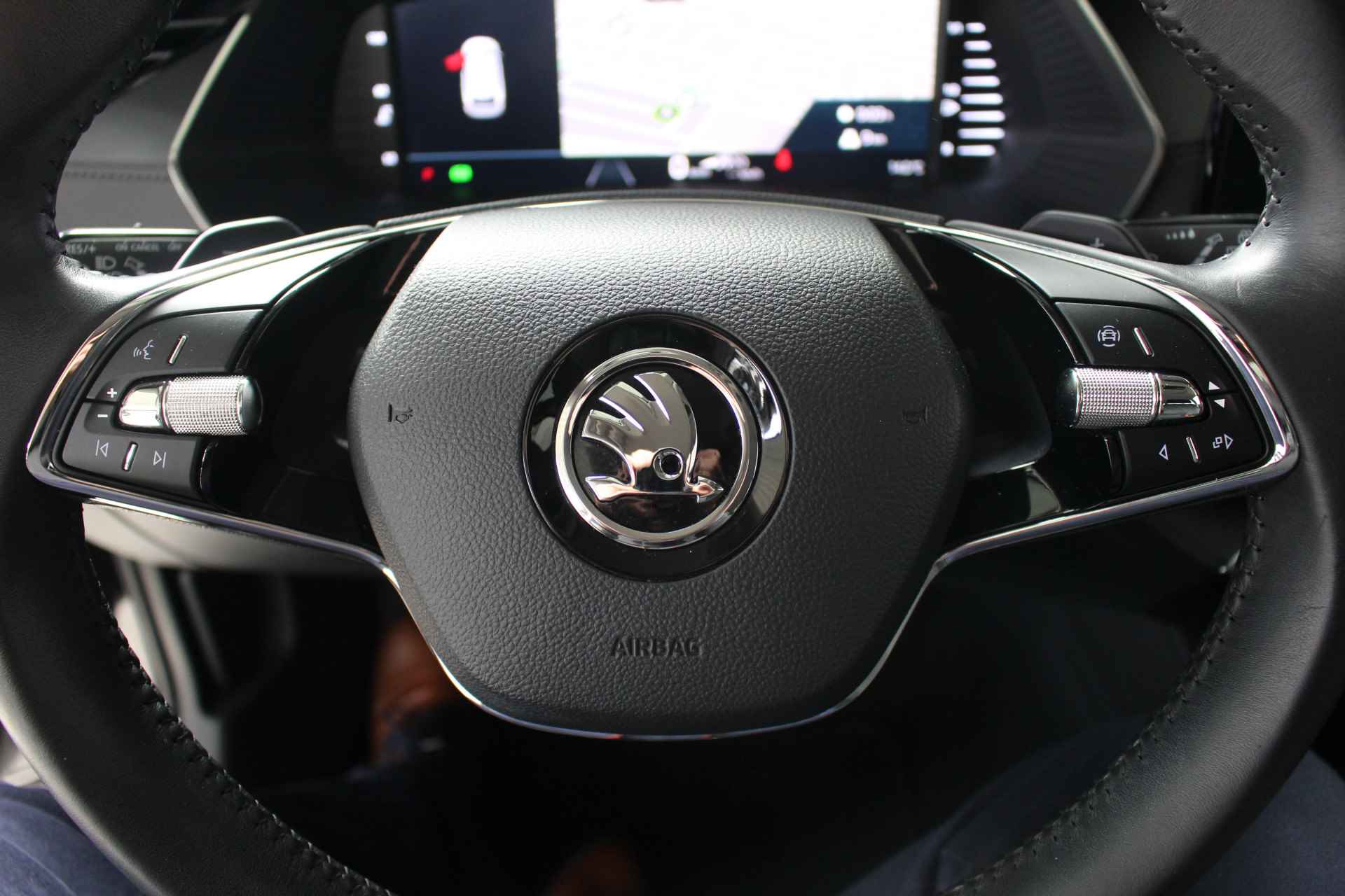 Škoda Octavia Combi 1.0 e-TSI MHEV Business Edition DSG Navigatie | lichtmetalen velgen | Parkeersensoren | El. achterklepbediening - 12/20